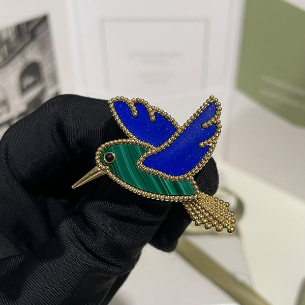 Van Cleef & Arpels Lucky Animals Humming Bird Brooch
Lapis Malachite
18K Yellow Gold