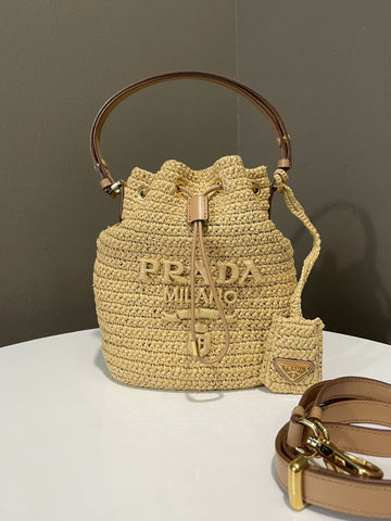 Open image in slideshow, Prada Crochet Bucket Bag Tan Raffia / Leather