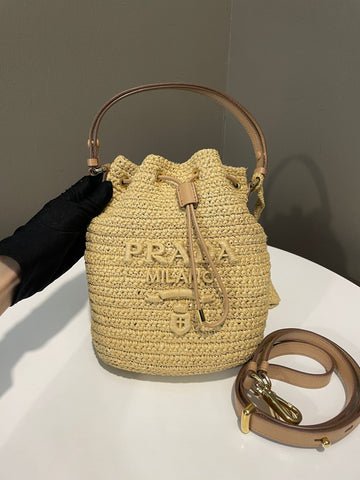 Open image in slideshow, Prada Crochet Bucket Bag Tan Raffia / Leather