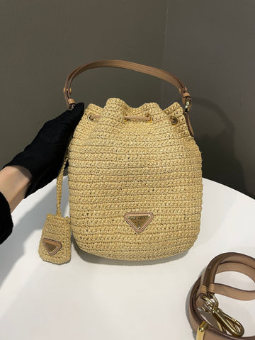 Open image in slideshow, Prada Crochet Bucket Bag Tan Raffia / Leather