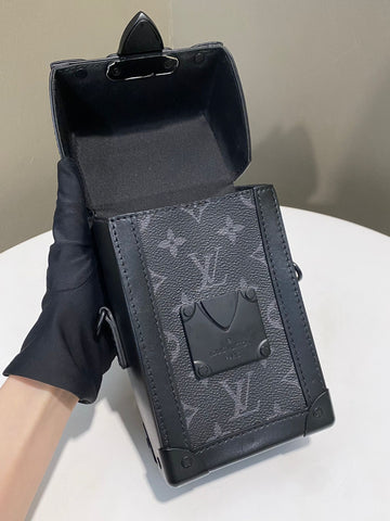 Open image in slideshow, Louis Vuitton Vertical Wearable Trunk Wallet Monogram Eclipse