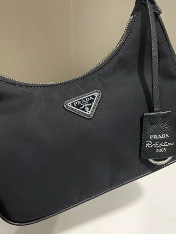 Open image in slideshow, Prada Re-Edition 2005 Nylon Bag Black Nylon