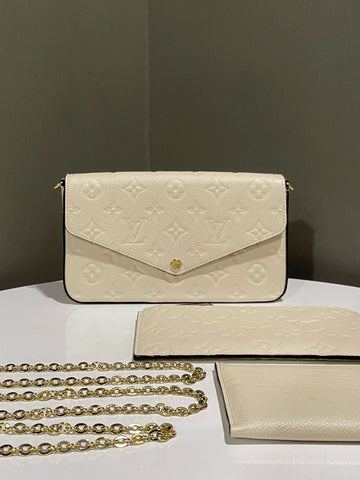 Open image in slideshow, Louis Vuitton Felicie Pochette Creme Monogram Empreinte Leather