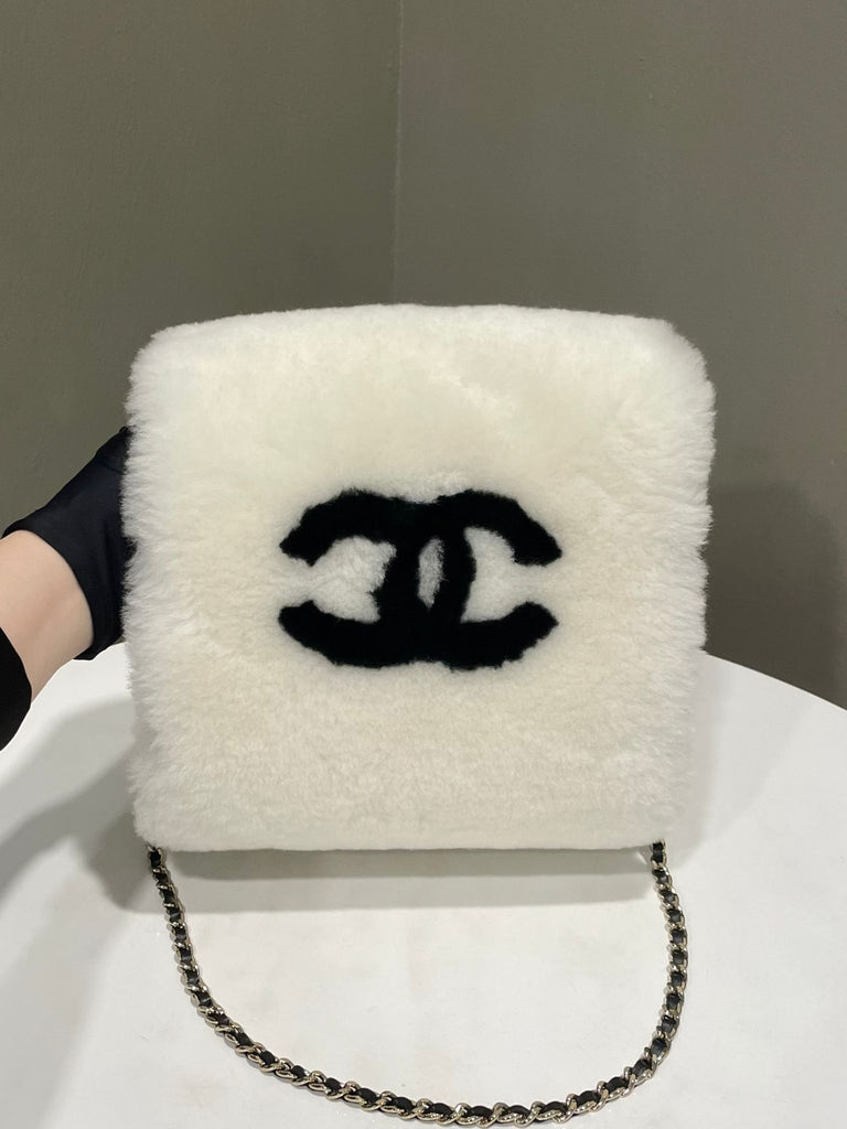Chanel Cc Chain Muffs Black / White Shearling