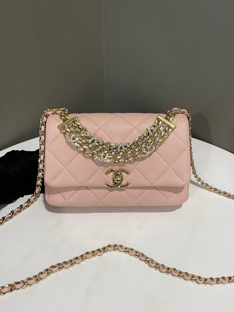 Chanel Quilted Cc Crystal Logo Chain Flap Bag 
Pink Lambskin