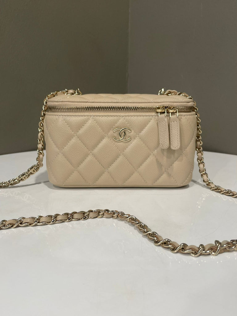 Chanel Quilted Cc Logo Chain Vanity Rectangular 
Beige Caviar