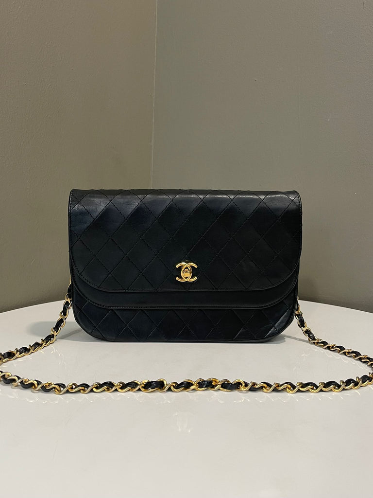 Chanel Timeless Curve Double Flap
Black Lambskin
