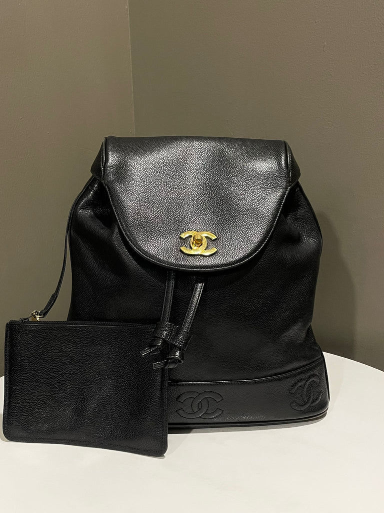Chanel Vintage CC Backpack 
Black Caviar
24K Gold Plated Hardware