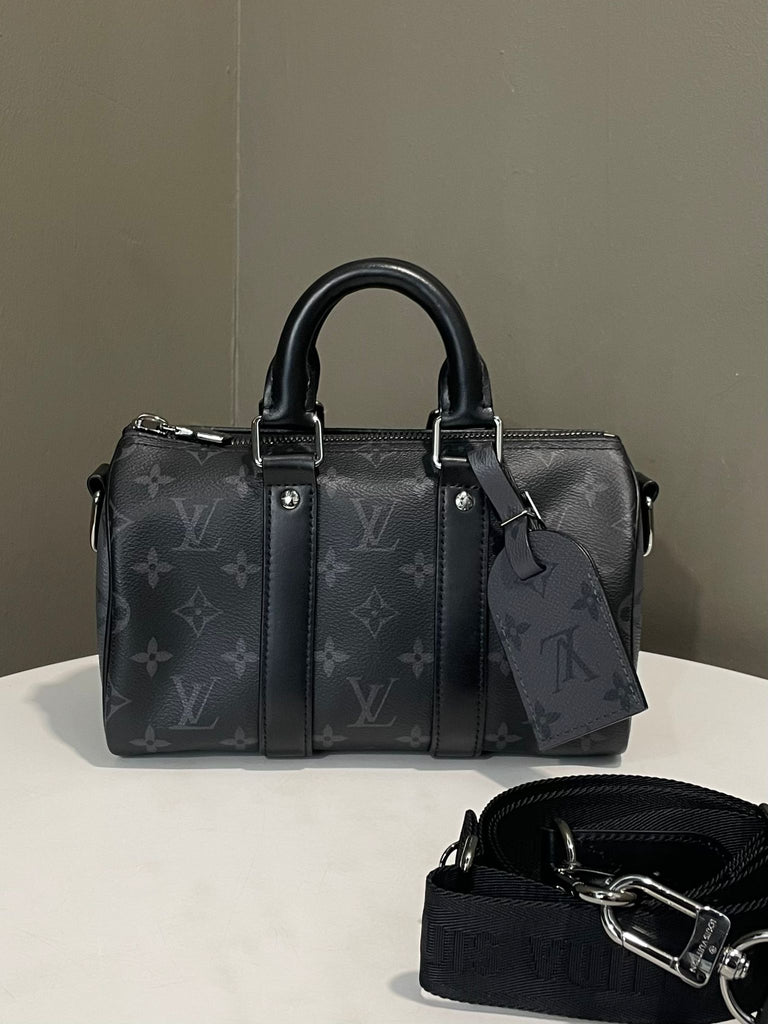 Louis Vuitton Keepall Bandoulière 25 Monogram Eclipse Reverse Coated Canvas