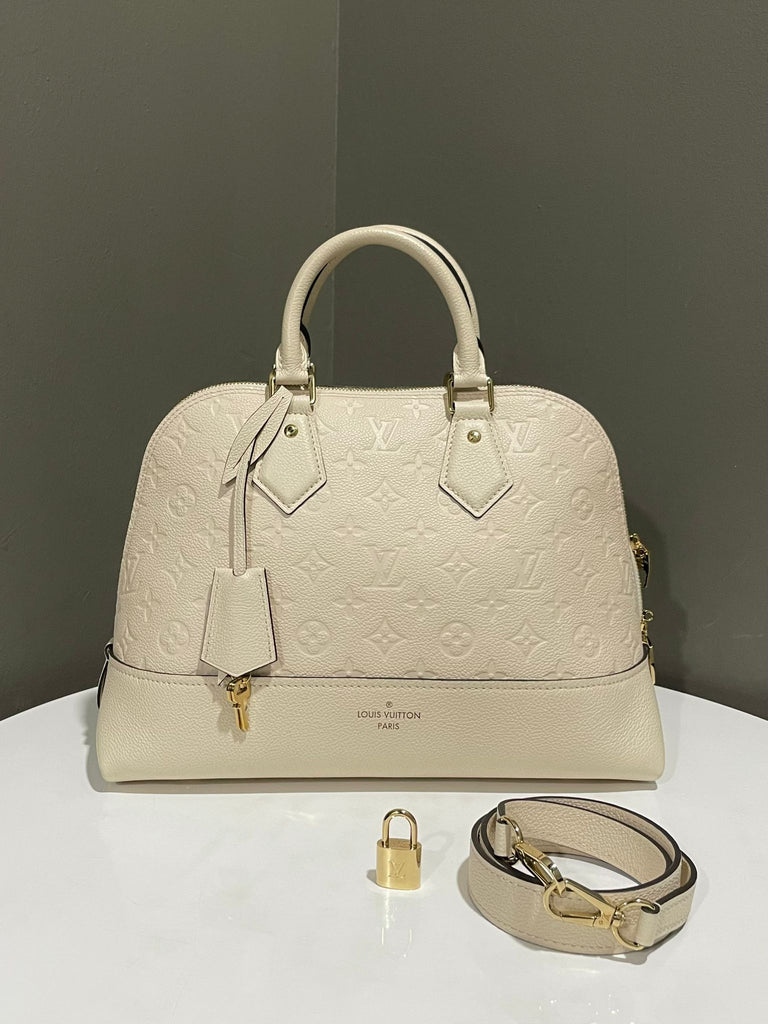 Louis Vuitton Neo Alma Cream Monogram Empreinte leather