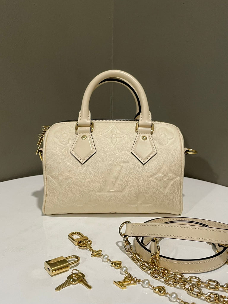 Louis Vuitton Speedy Bandoulière 20 Creme Empreinte Leather