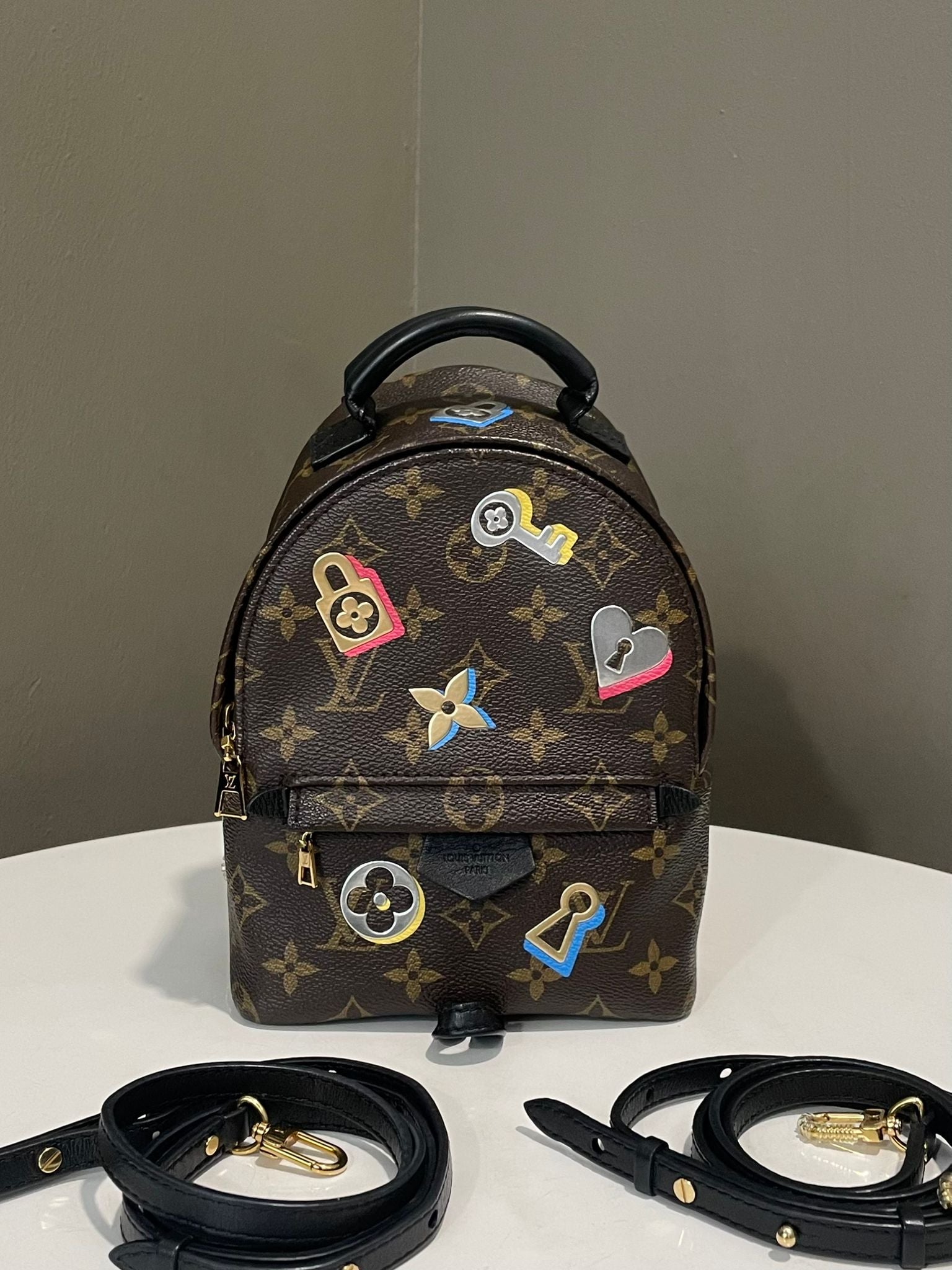 Louis Vuitton Love Lock Palm Spring Mini Backpack Classic Monogram LOVELOTSLUXURY Louis Vuitton Love Lock Palm Spring Mini Backpack Classic Monogram LOVELOTSLUXURY