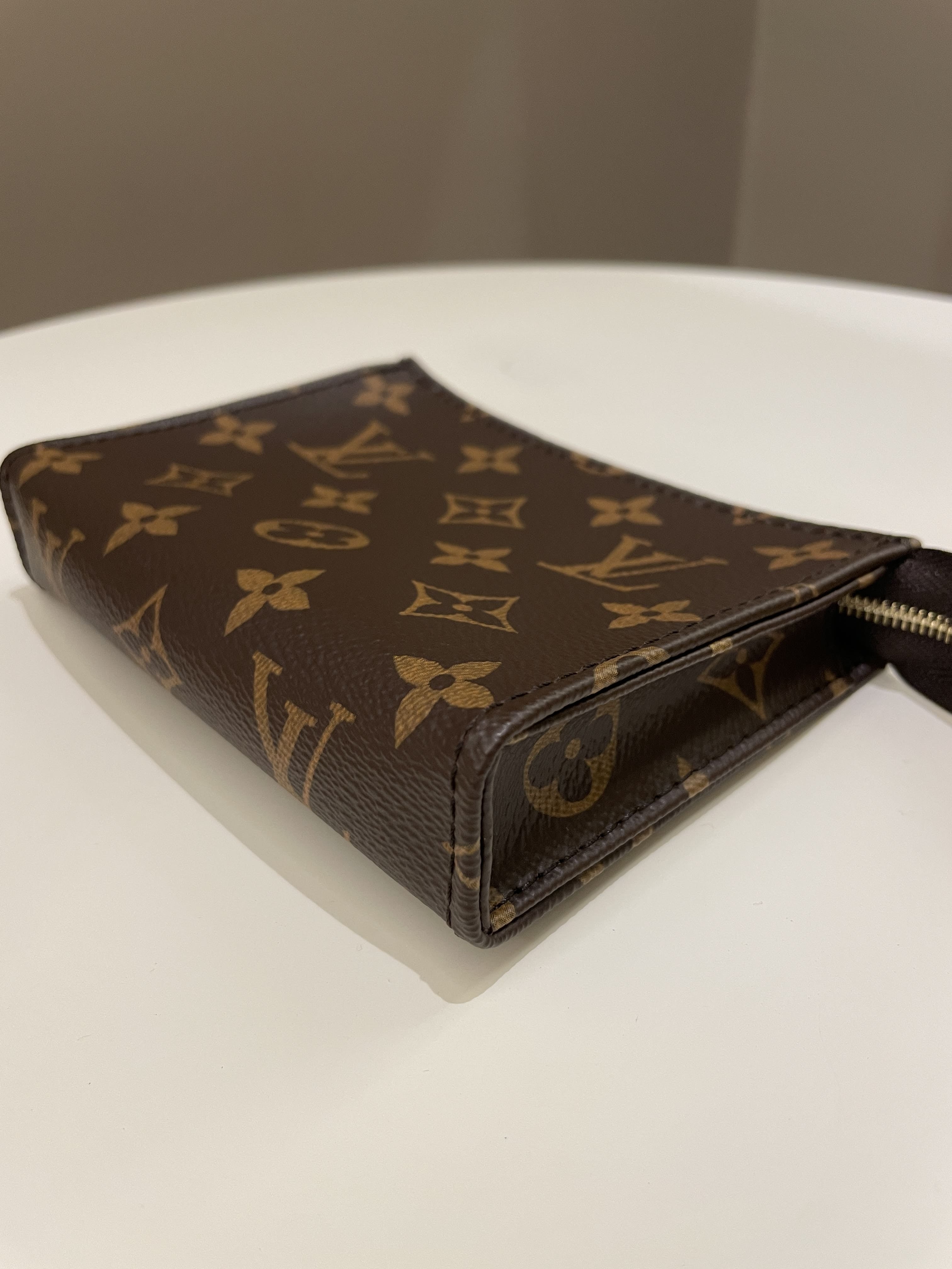 Louis Vuitton Toiletry Pouch On Chain, Luxury, Bags & Wallets on Carousell