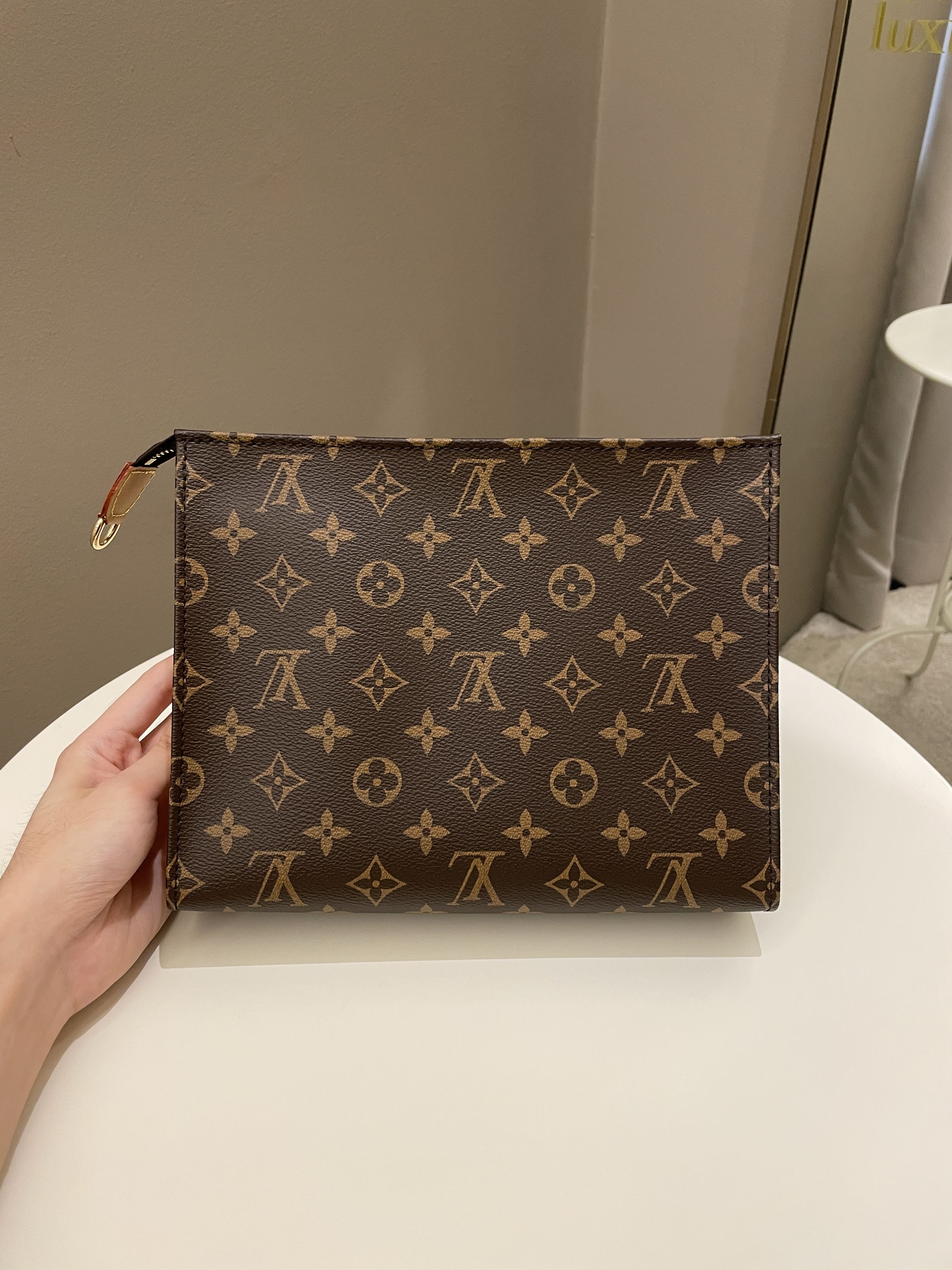 New Louis Vuitton Monogram Toiletry Clutch in Box For Sale at
