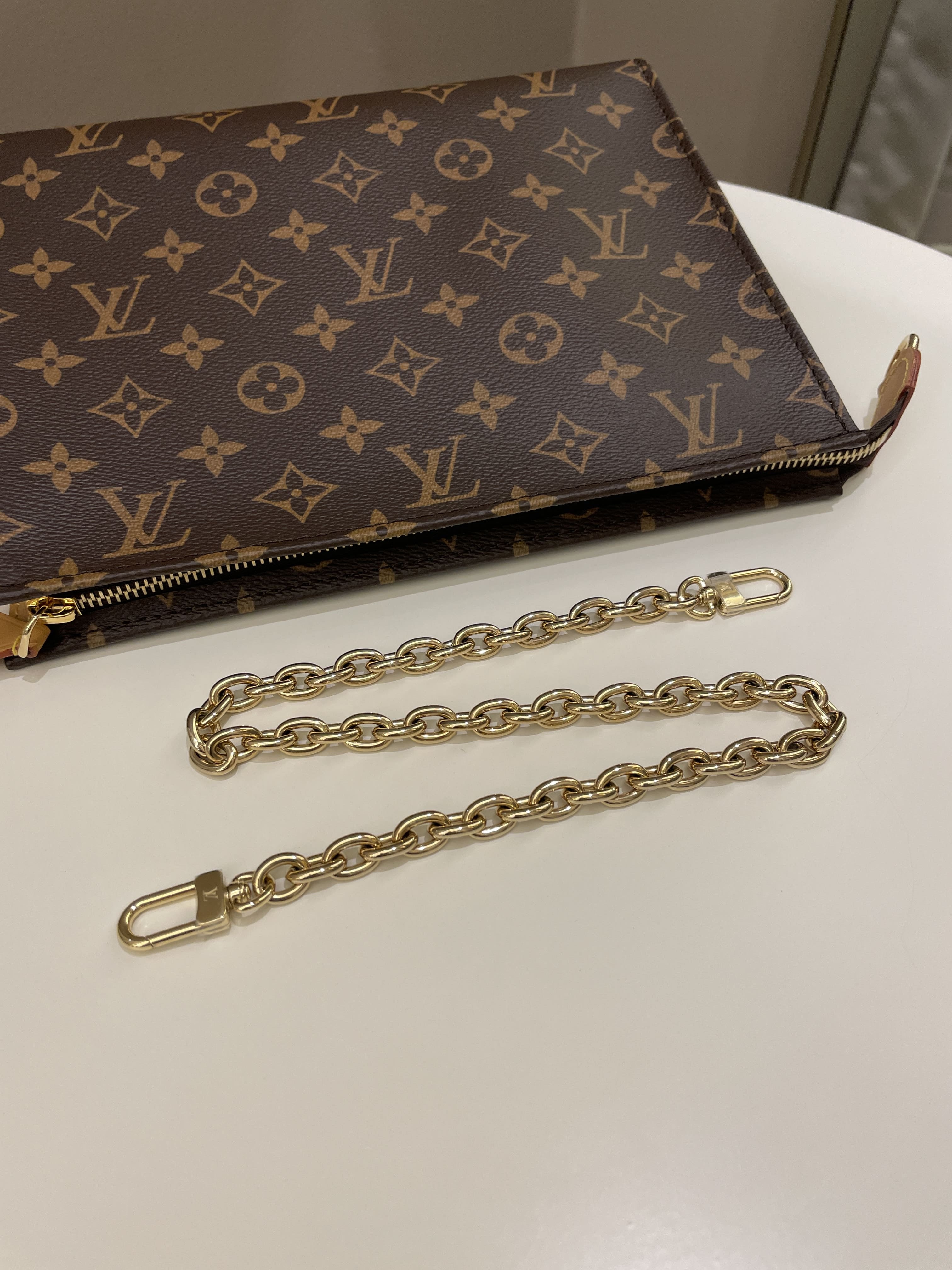 Louis Vuitton Toiletry Pouch On Chain, Luxury, Bags & Wallets on Carousell