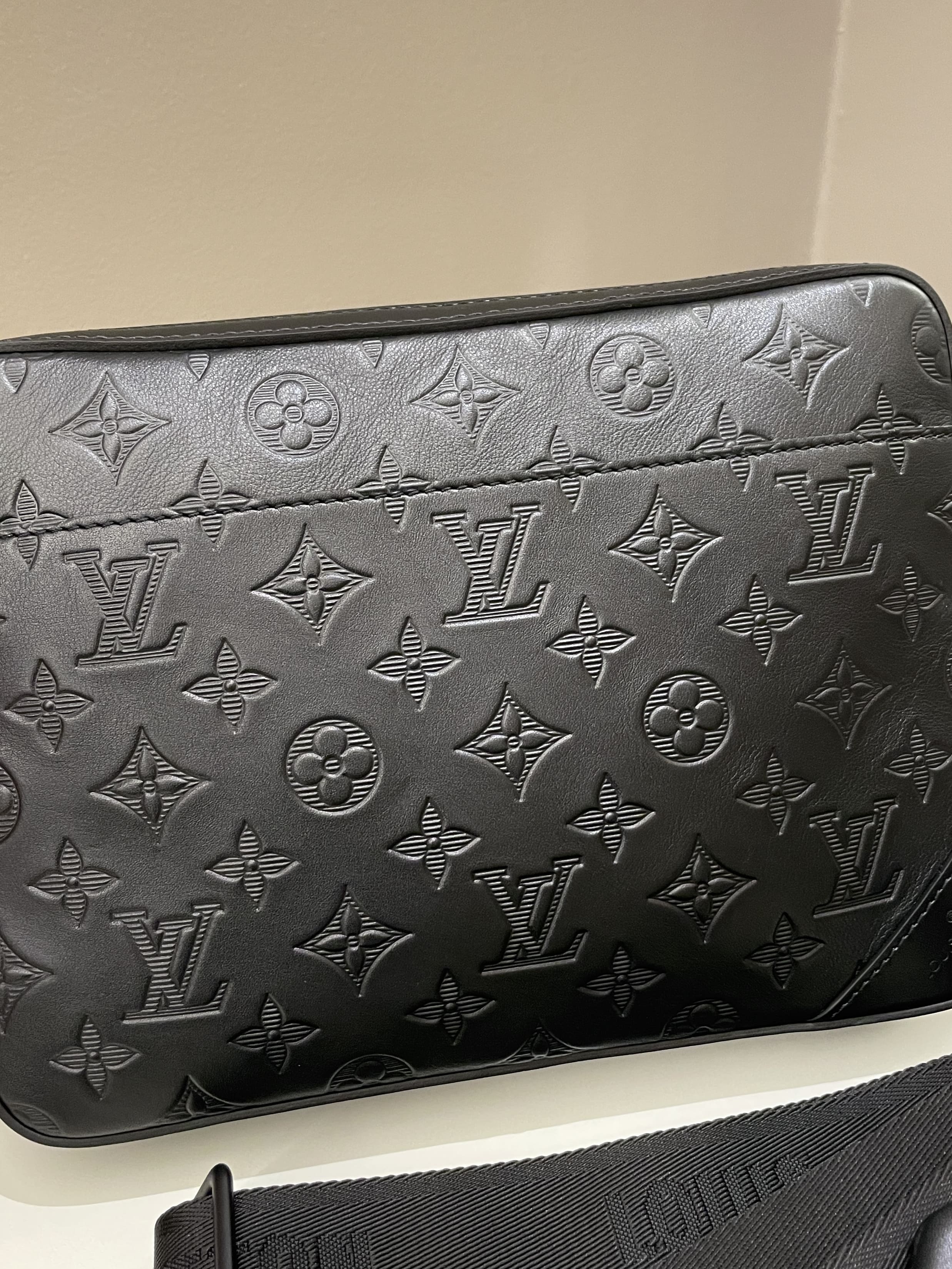 Louis Vuitton Leather Monogram Embossed Clutch Black