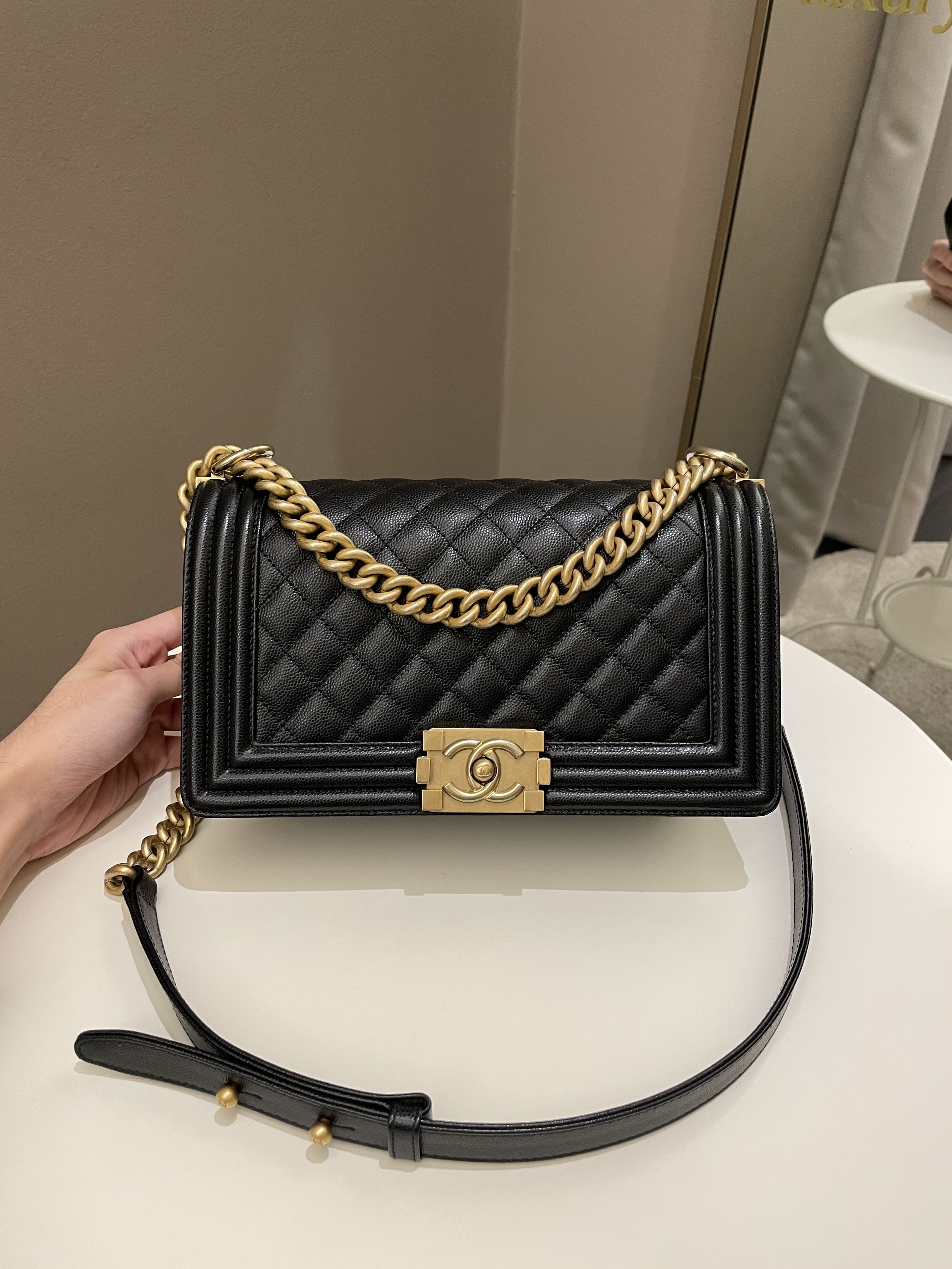 Handbags Chanel Chanel Womens North South Boy Bag Black Caviar Leather / Gold