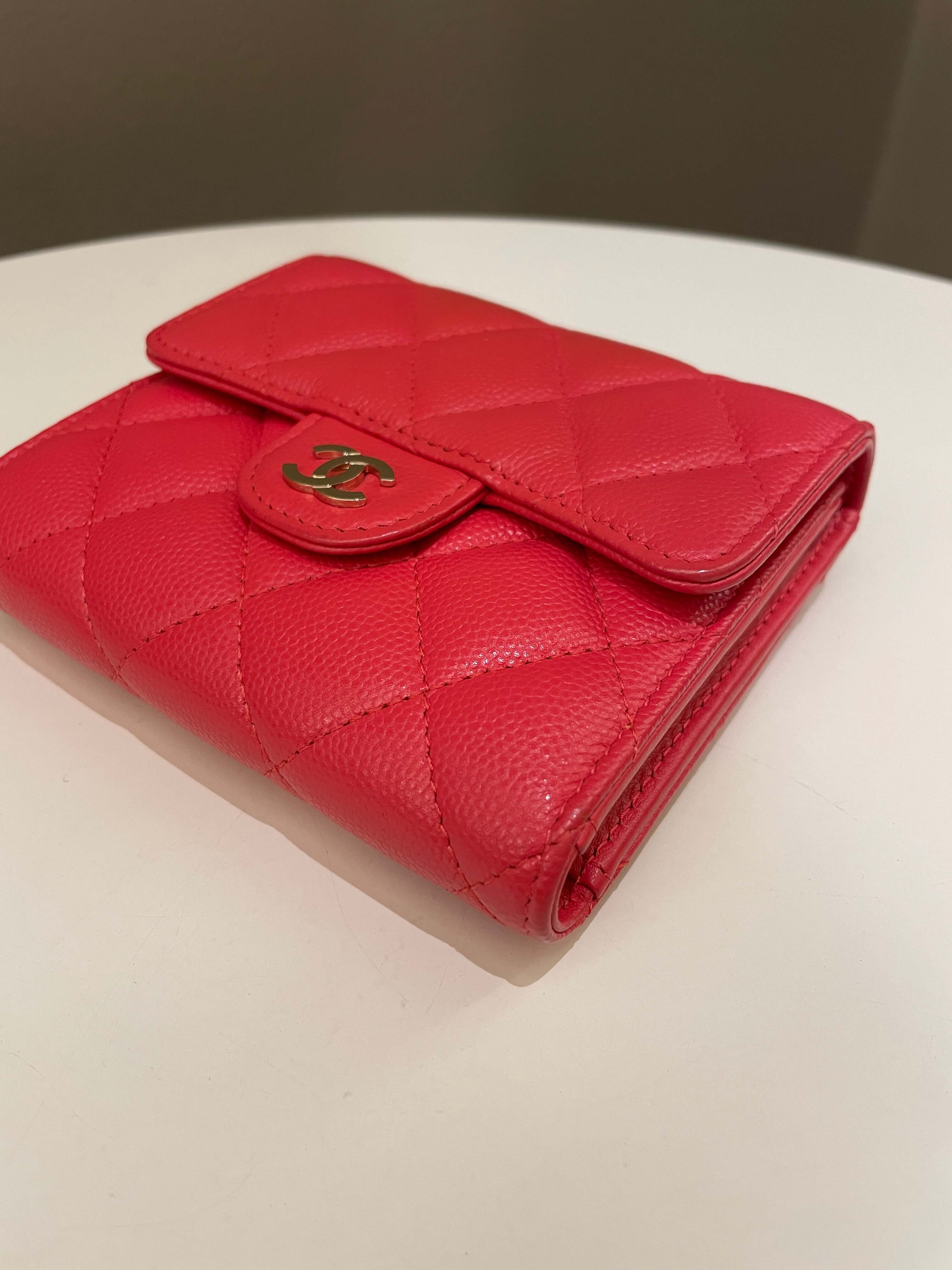 Chanel Classic Quilted Tri Fold Compact Wallet
Coral Red Caviar
