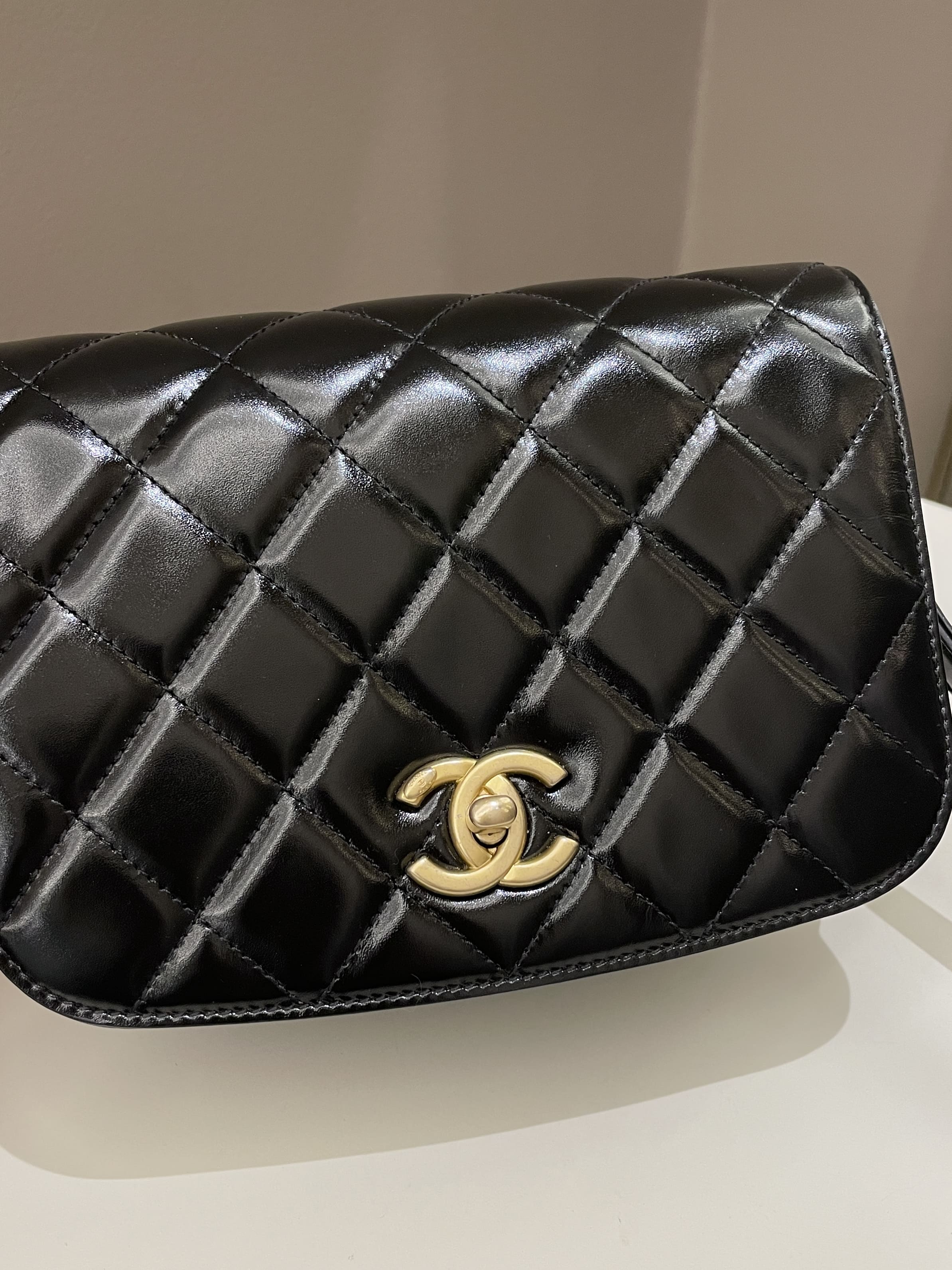 Chanel CC Eyelet Flap Bag