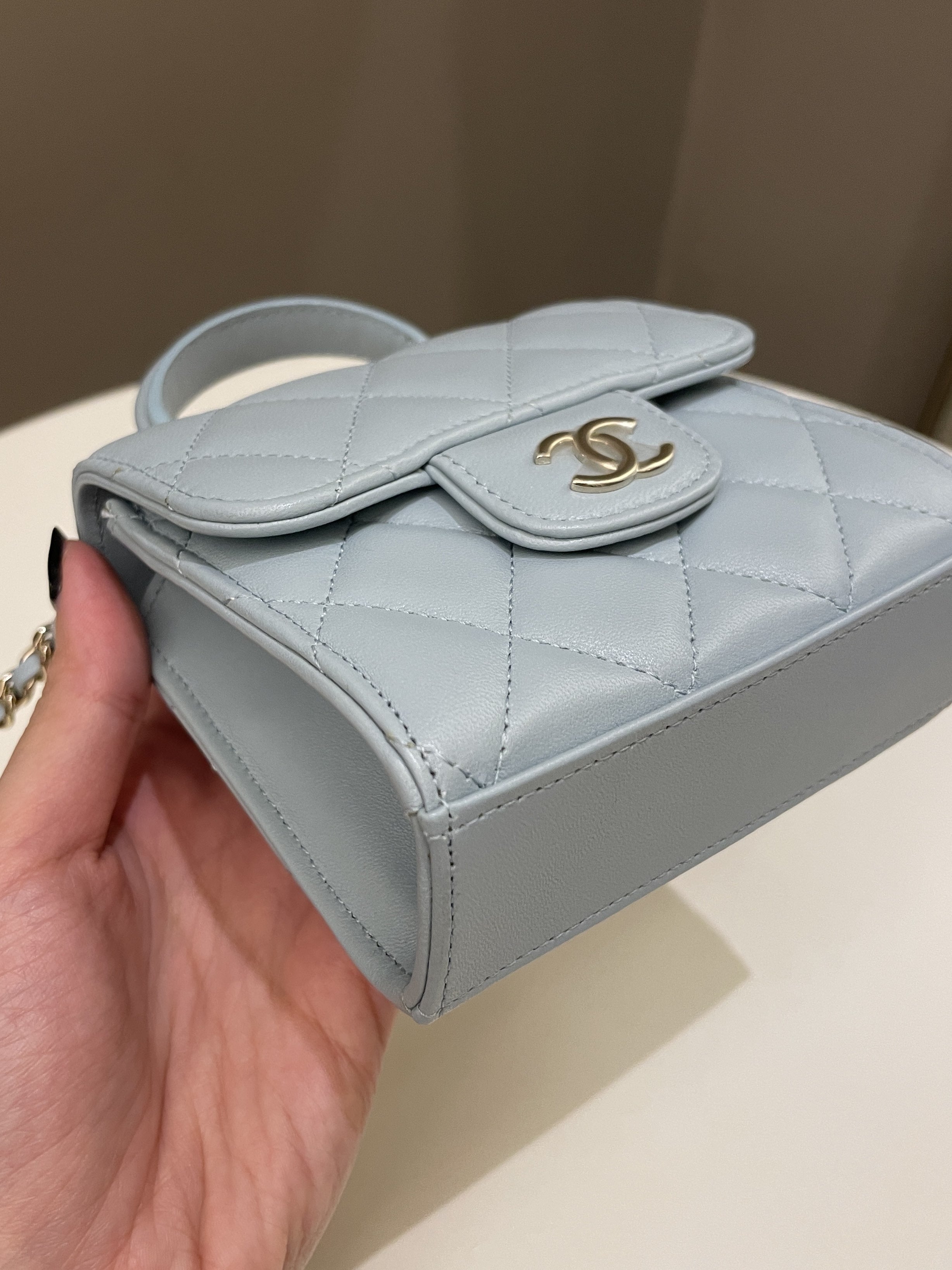 Chanel 22P Top Handle Clutch On Chain Baby Blue Lambskin