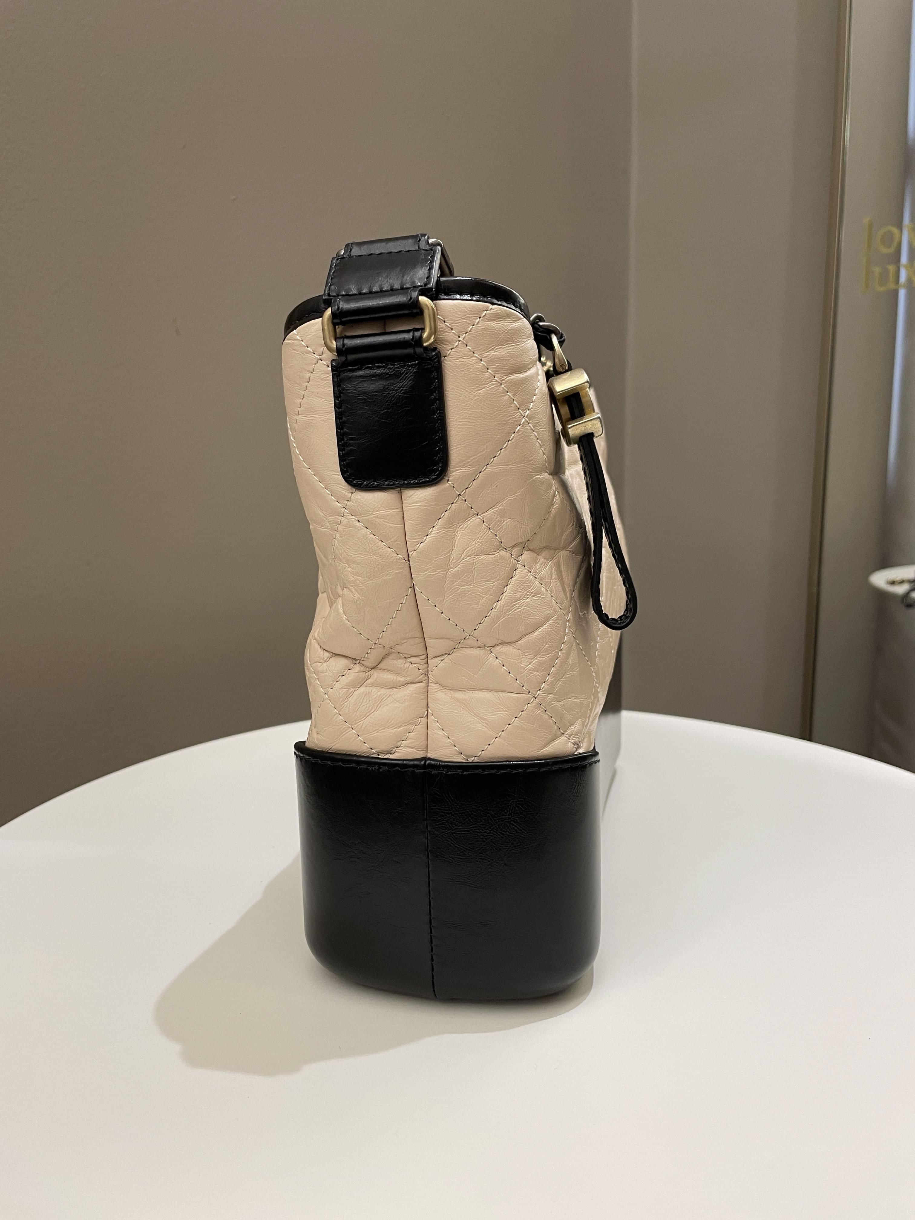 Chanel Beige And Black Quilted Aged Calfskin Gabrielle Large Hobo, 2019  Available For Immediate Sale At Sotheby's