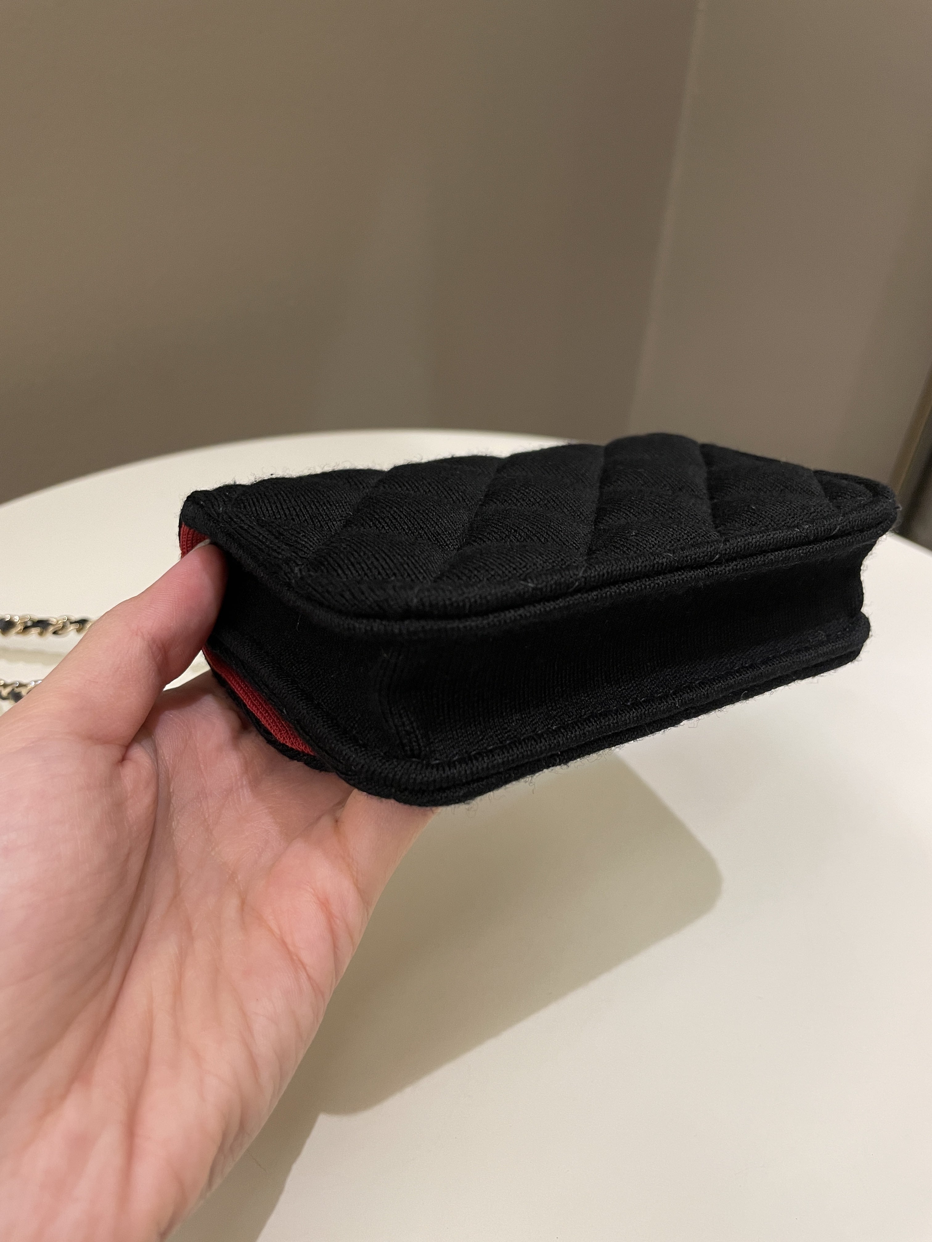Chanel 23C Quilted VIP Clutch On Chain
Black Jersey/ Red Interior