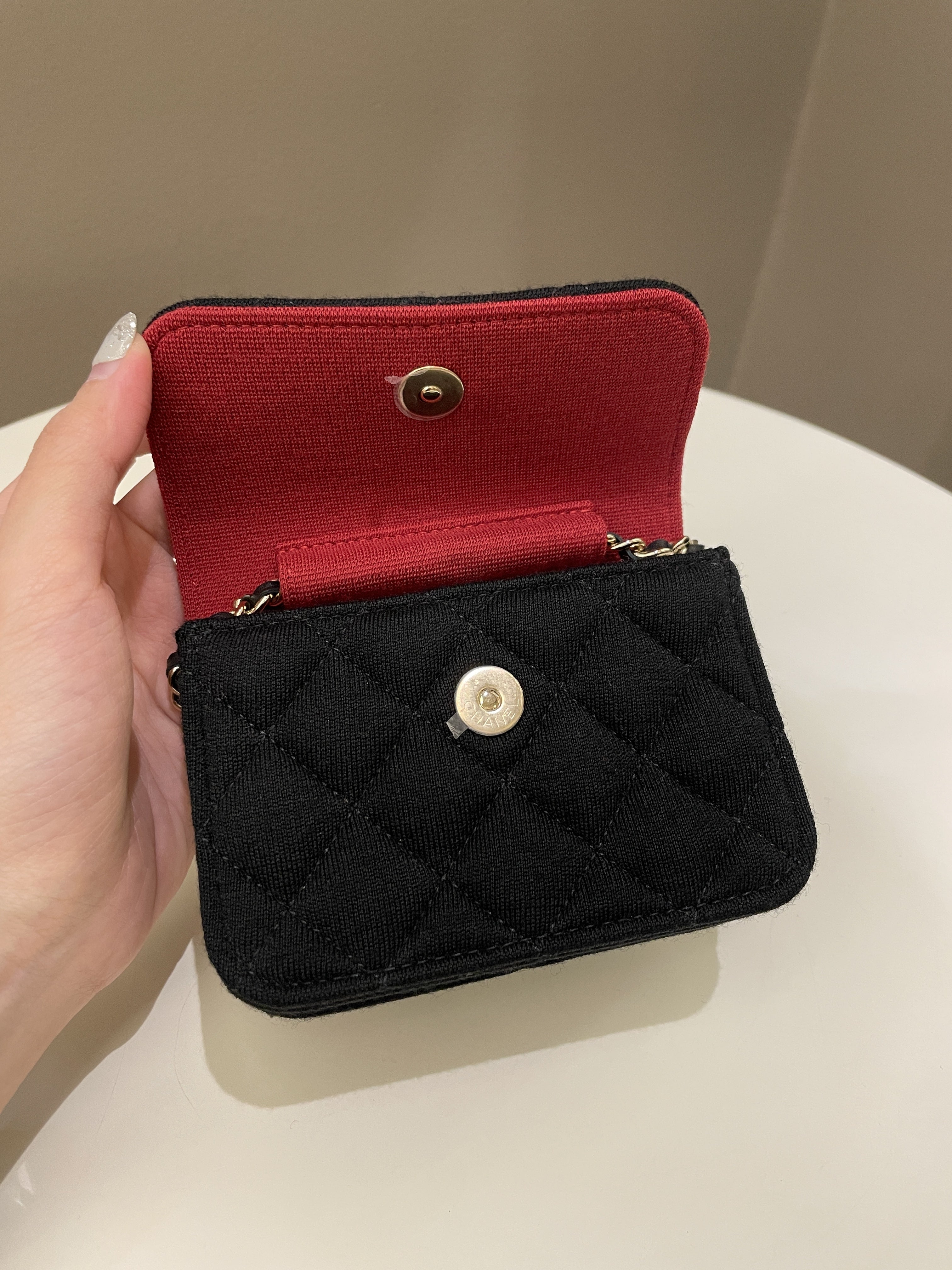 Chanel 23C Quilted VIP Clutch On Chain
Black Jersey/ Red Interior