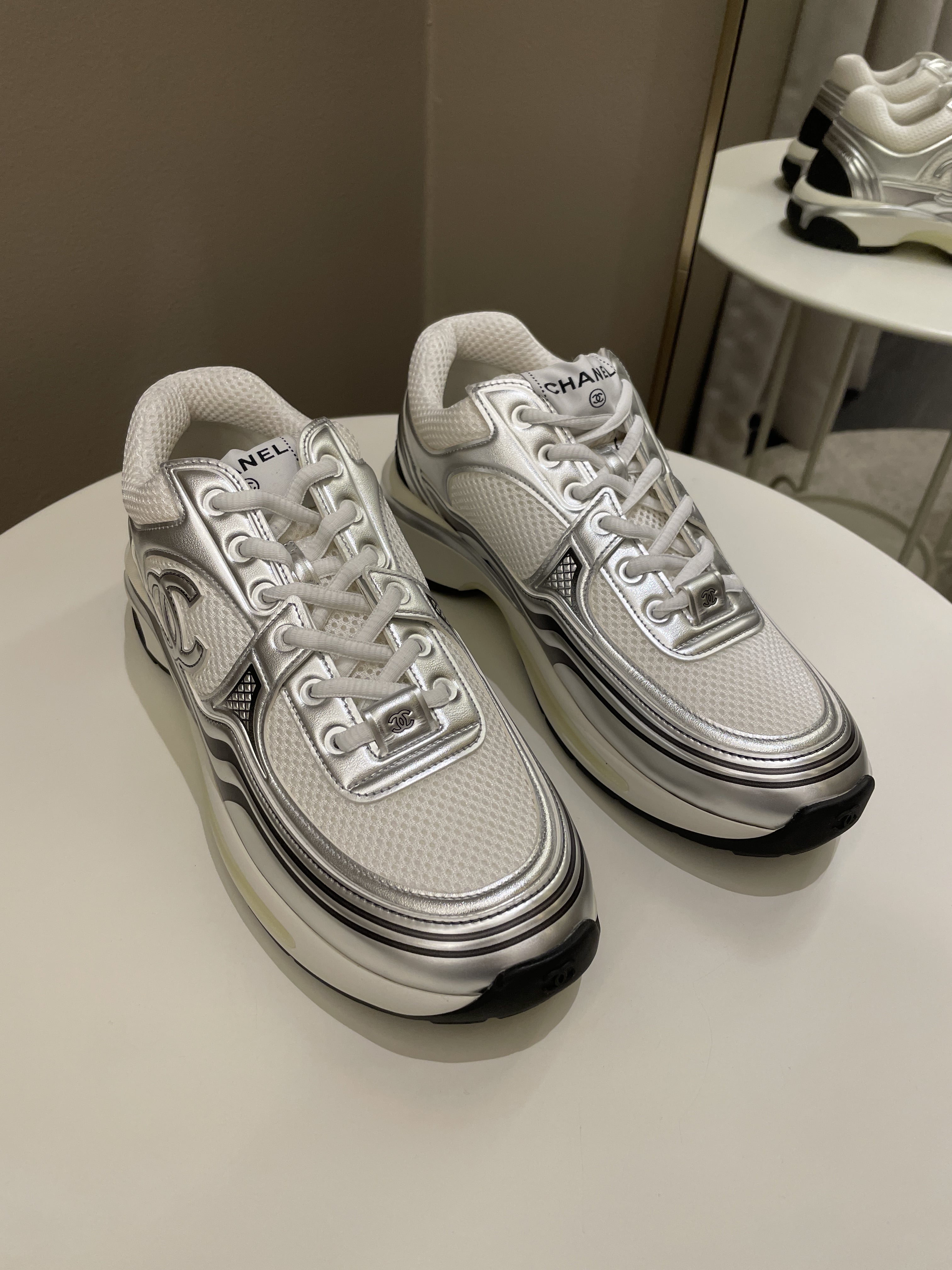 Chanel 23C Sneaker
Silver Size 40