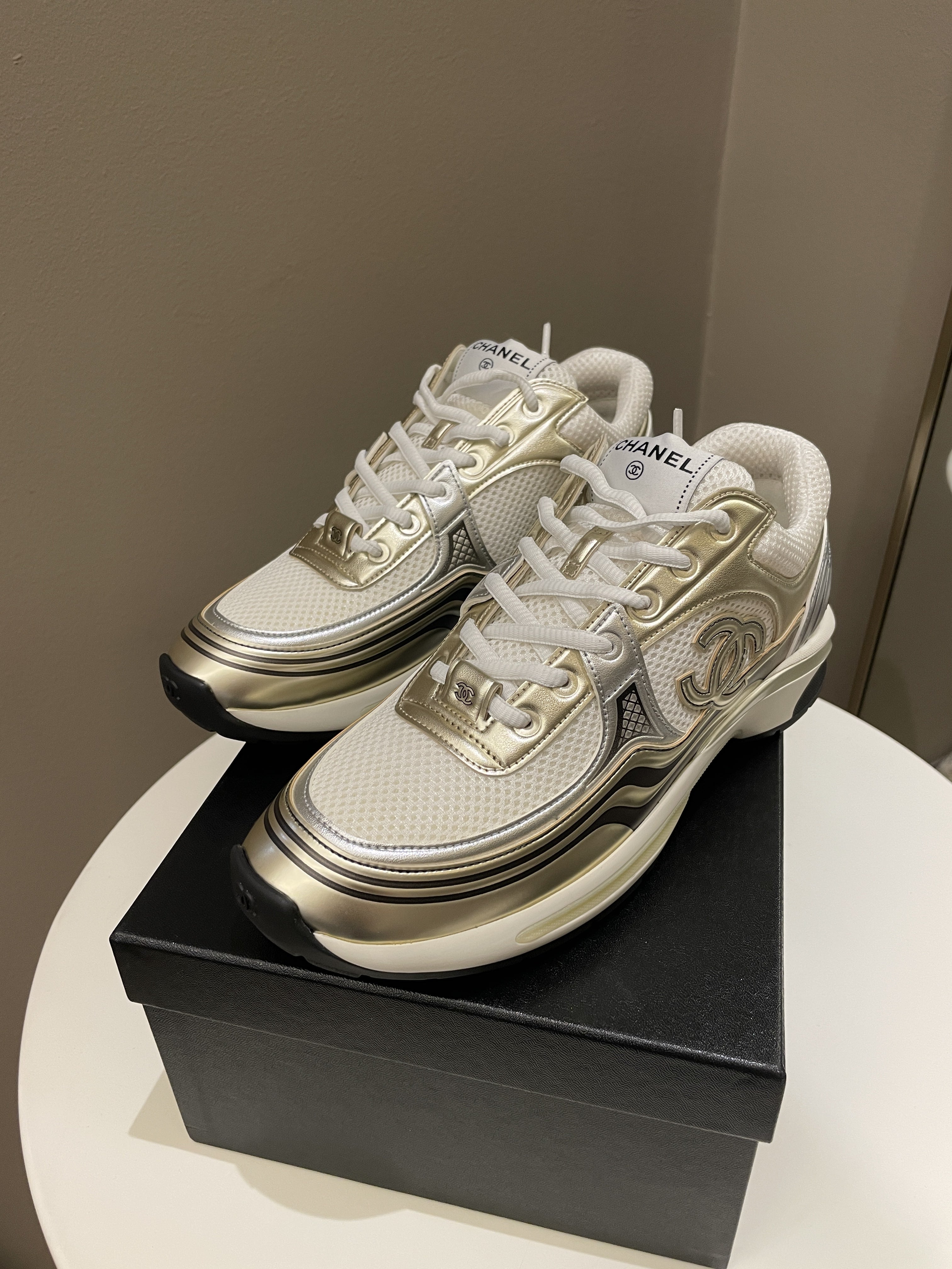 Chanel 23C Sneaker
Gold Size 40