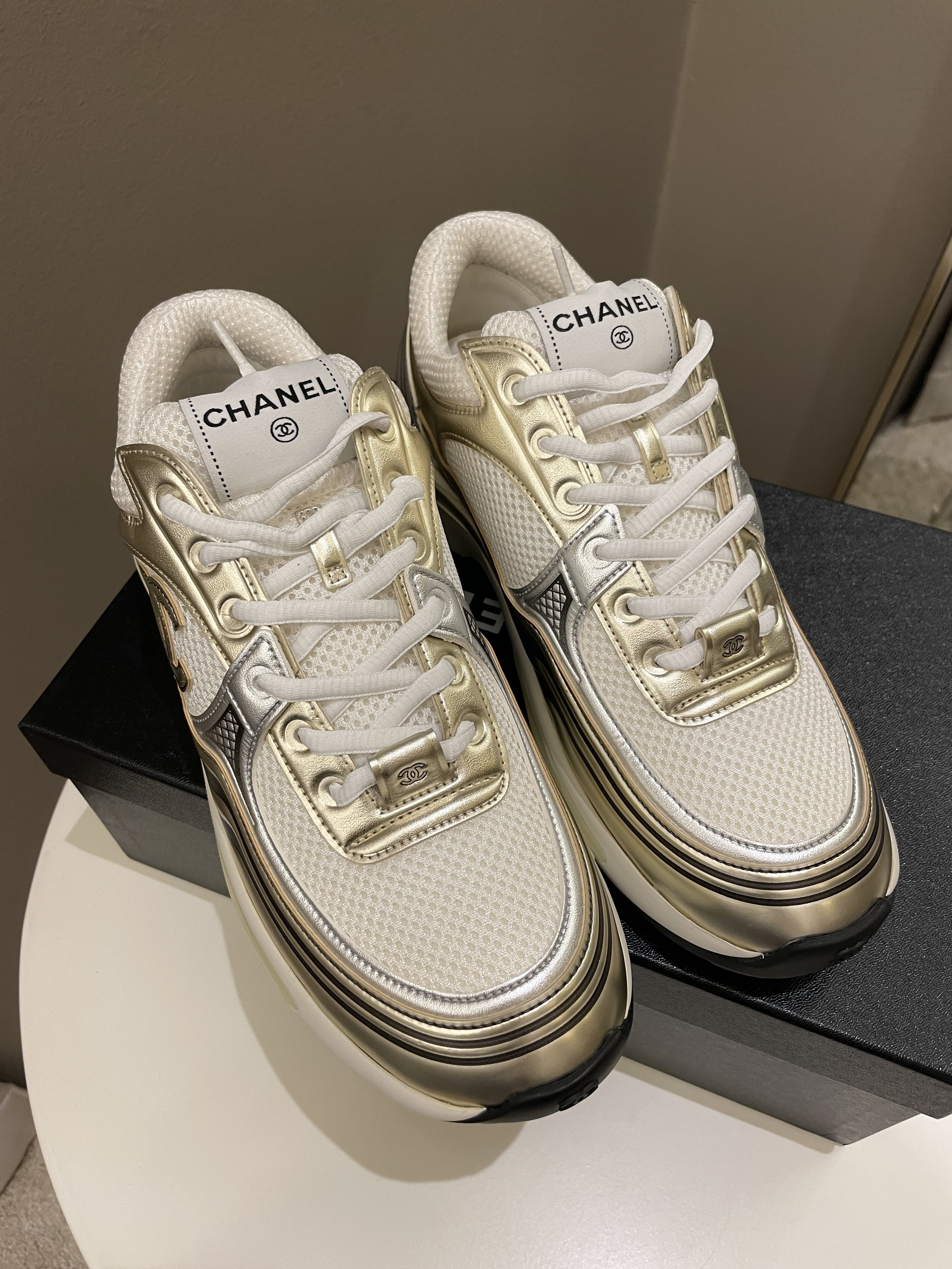 Chanel 23C Sneaker
Gold Size 40