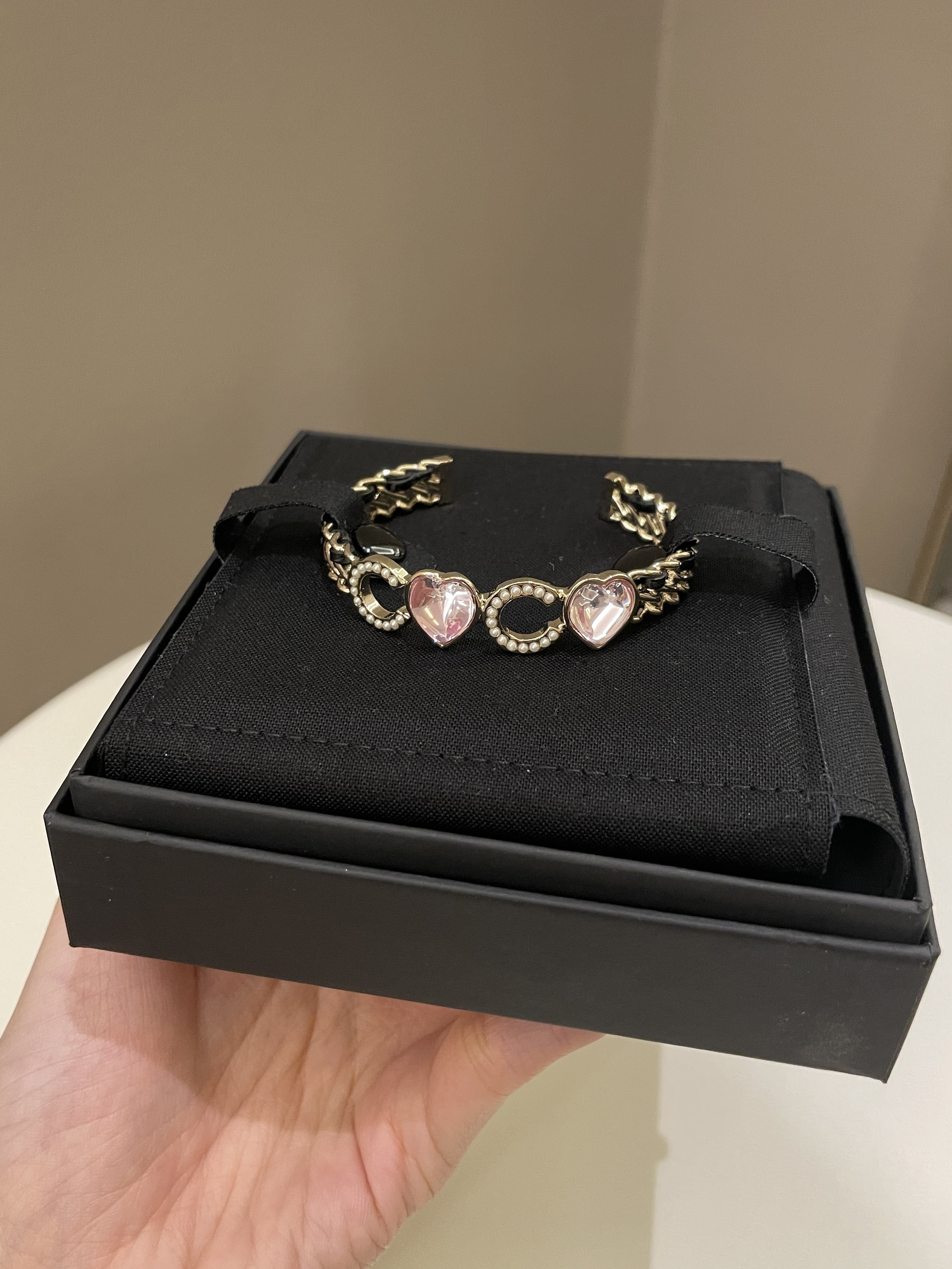 Chanel 23C Coco Cuff Bracelet
Ivory Glass Pearls
