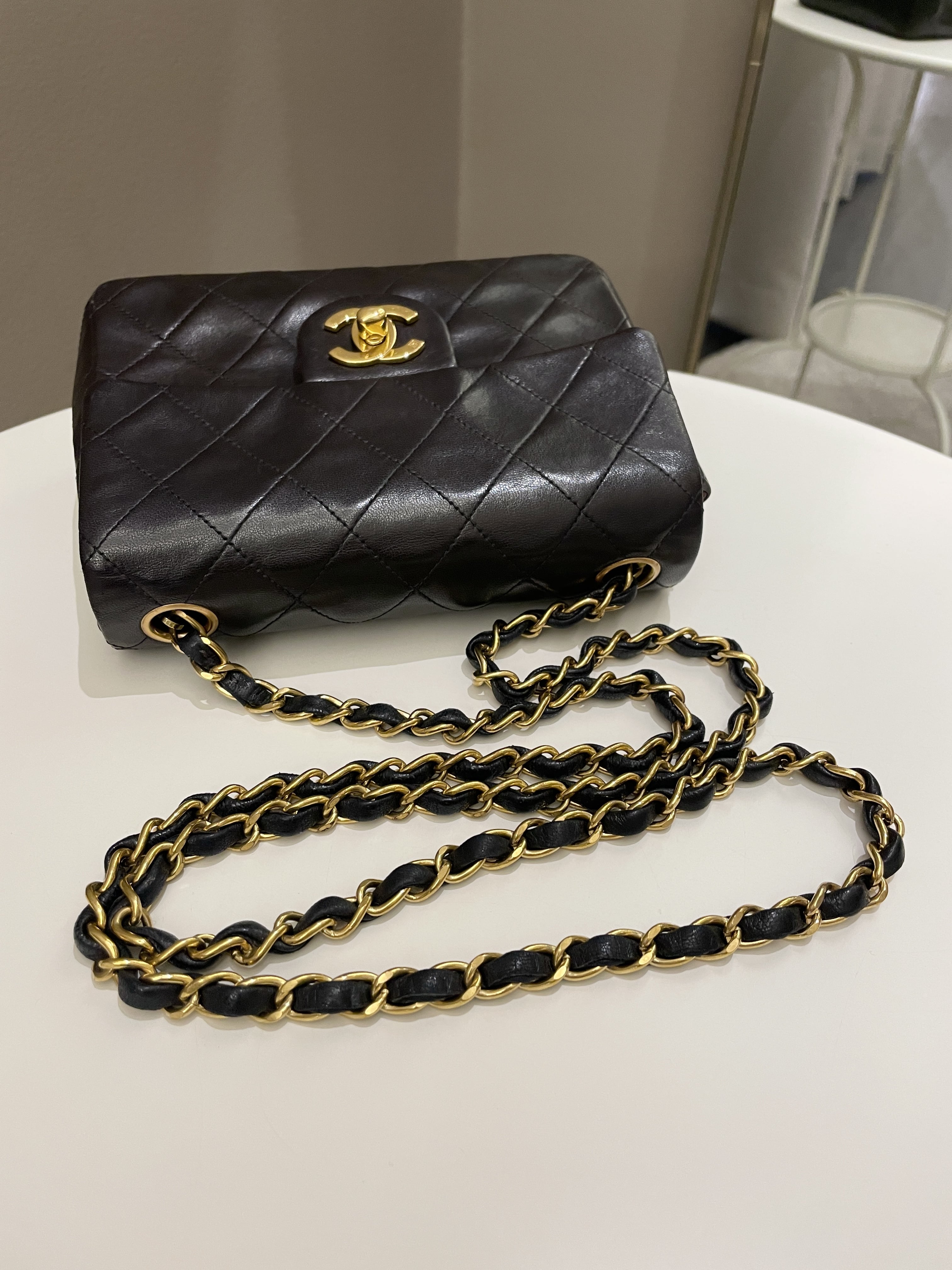 Chanel Vintage Classic Quilted Mini Square
Black Lambskin