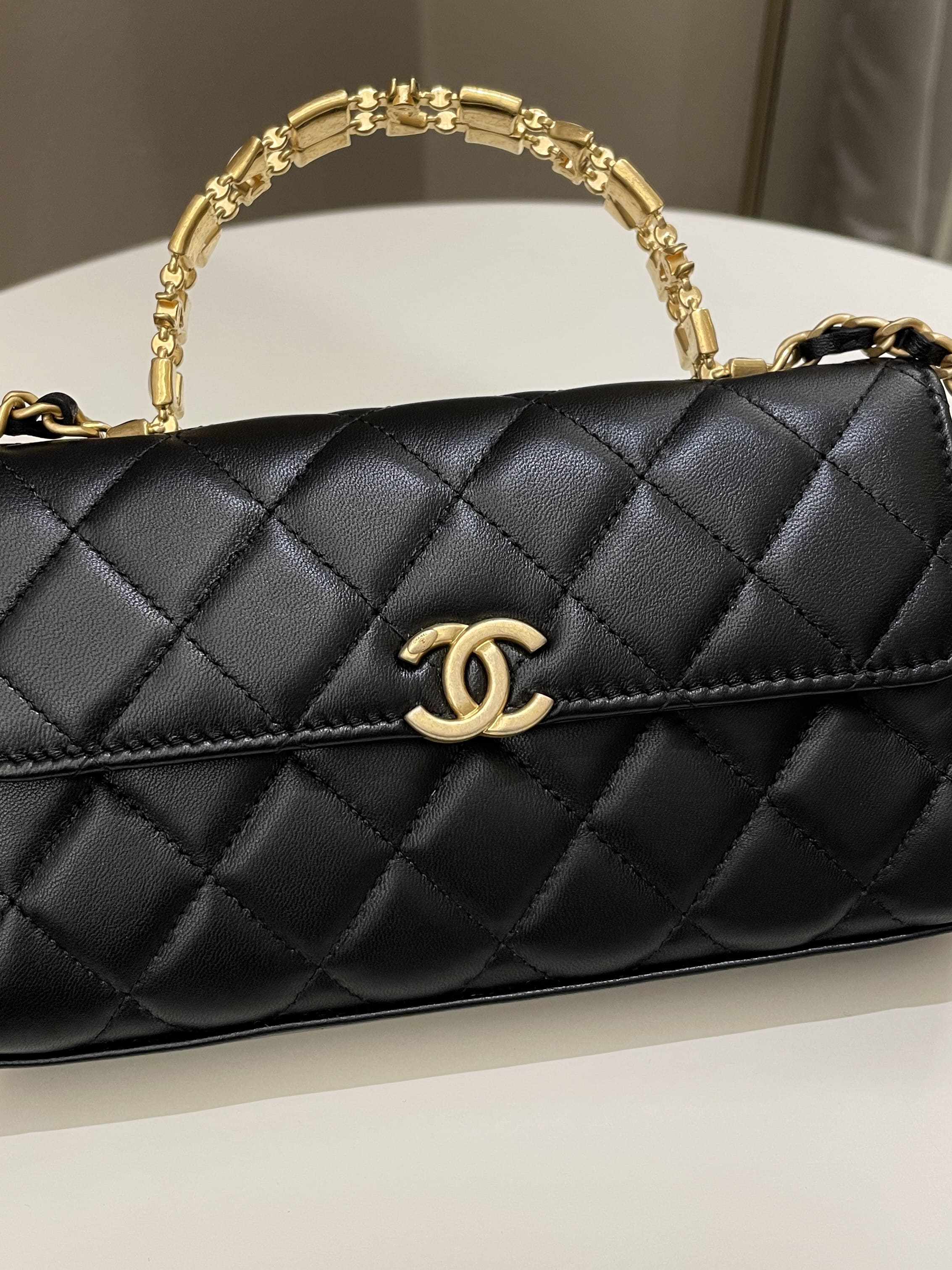 CHANEL Black 22B Lambskin Quilted Handle Flap Turnlock Chain Top Crossbody  Bag