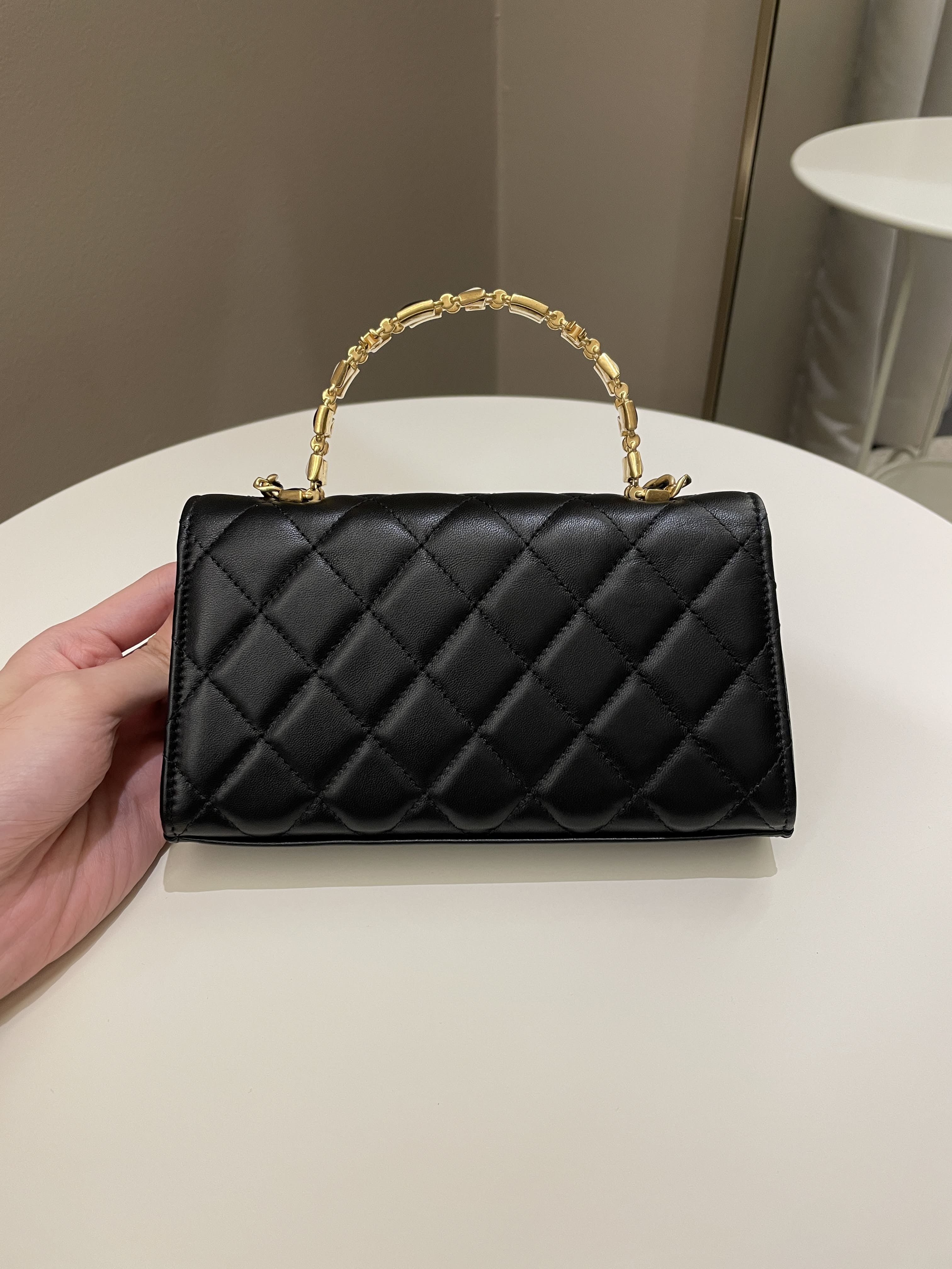 black chanel flap bag with top handle handbag