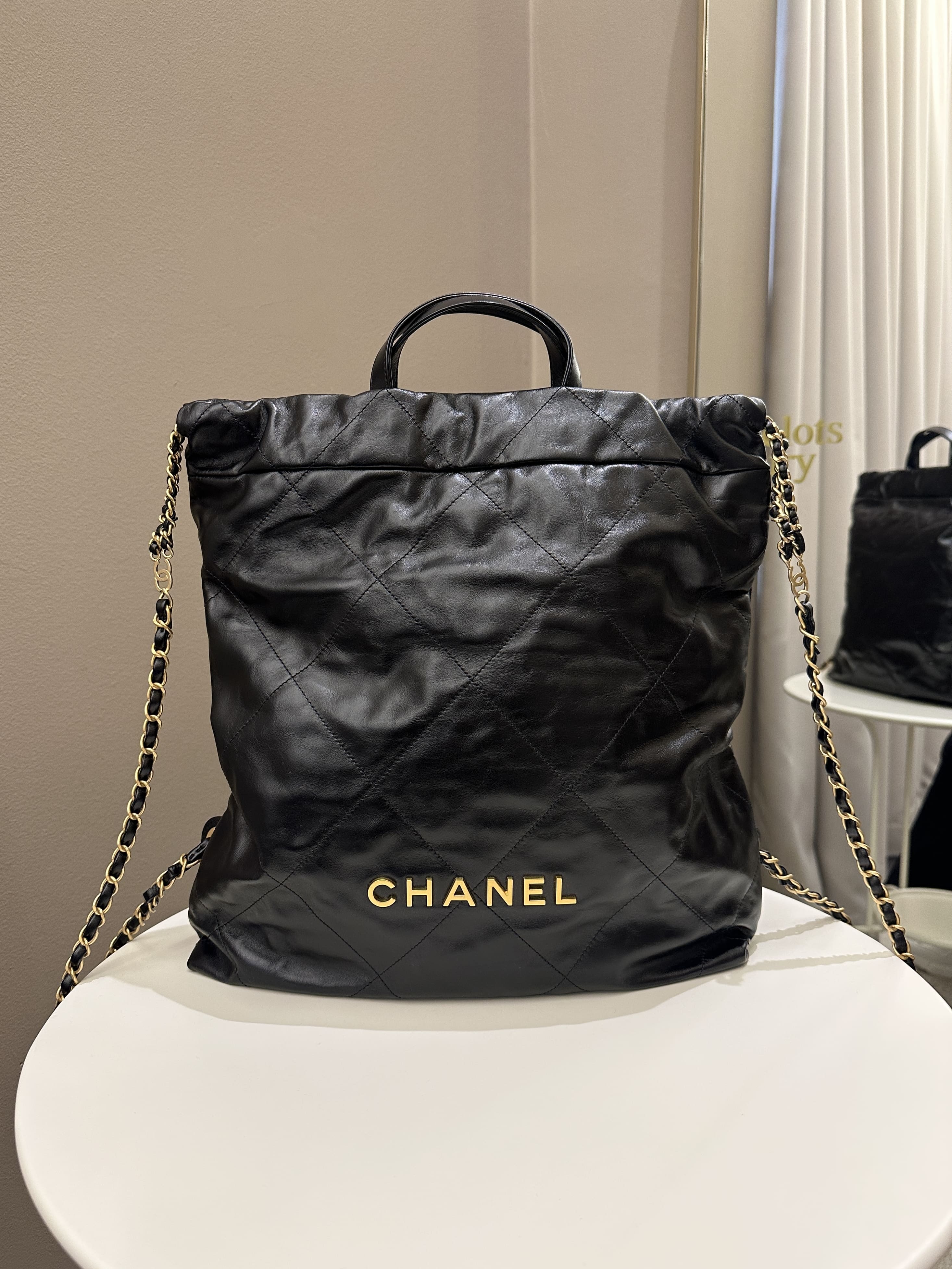 Chanel Black Quilted Calfskin Top Handle 22 Backpack Gold Hardware