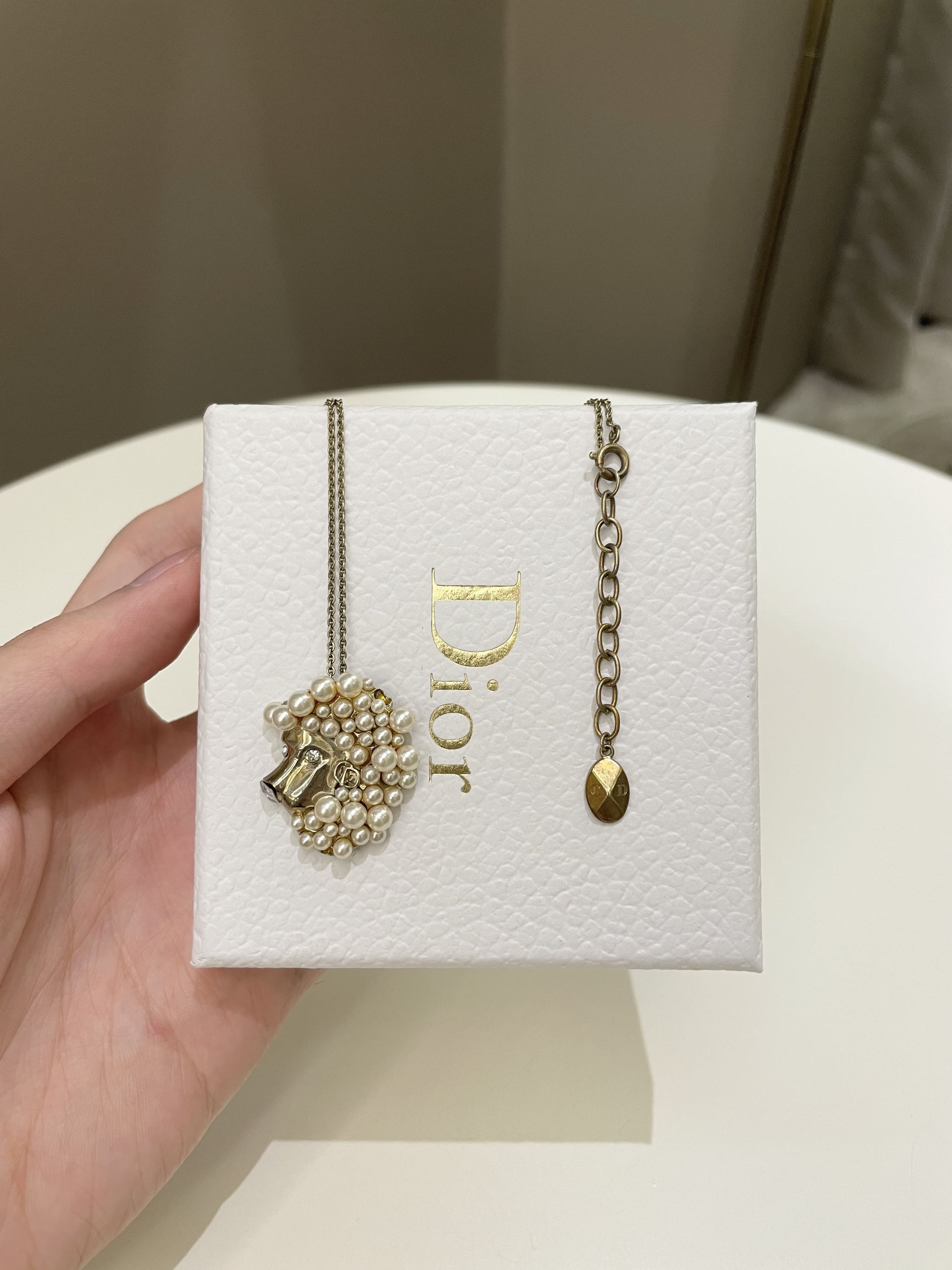 Dior zodiac necklace best sale