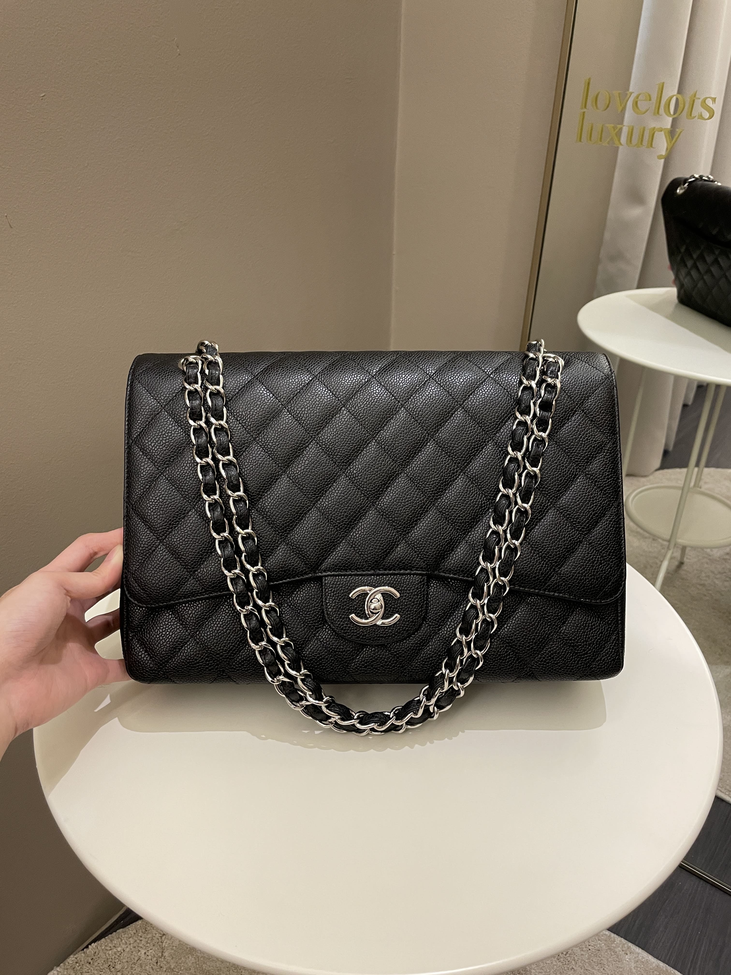 Chanel Quilted Black Caviar Leather Maxi Classic Silver Chain Flap
