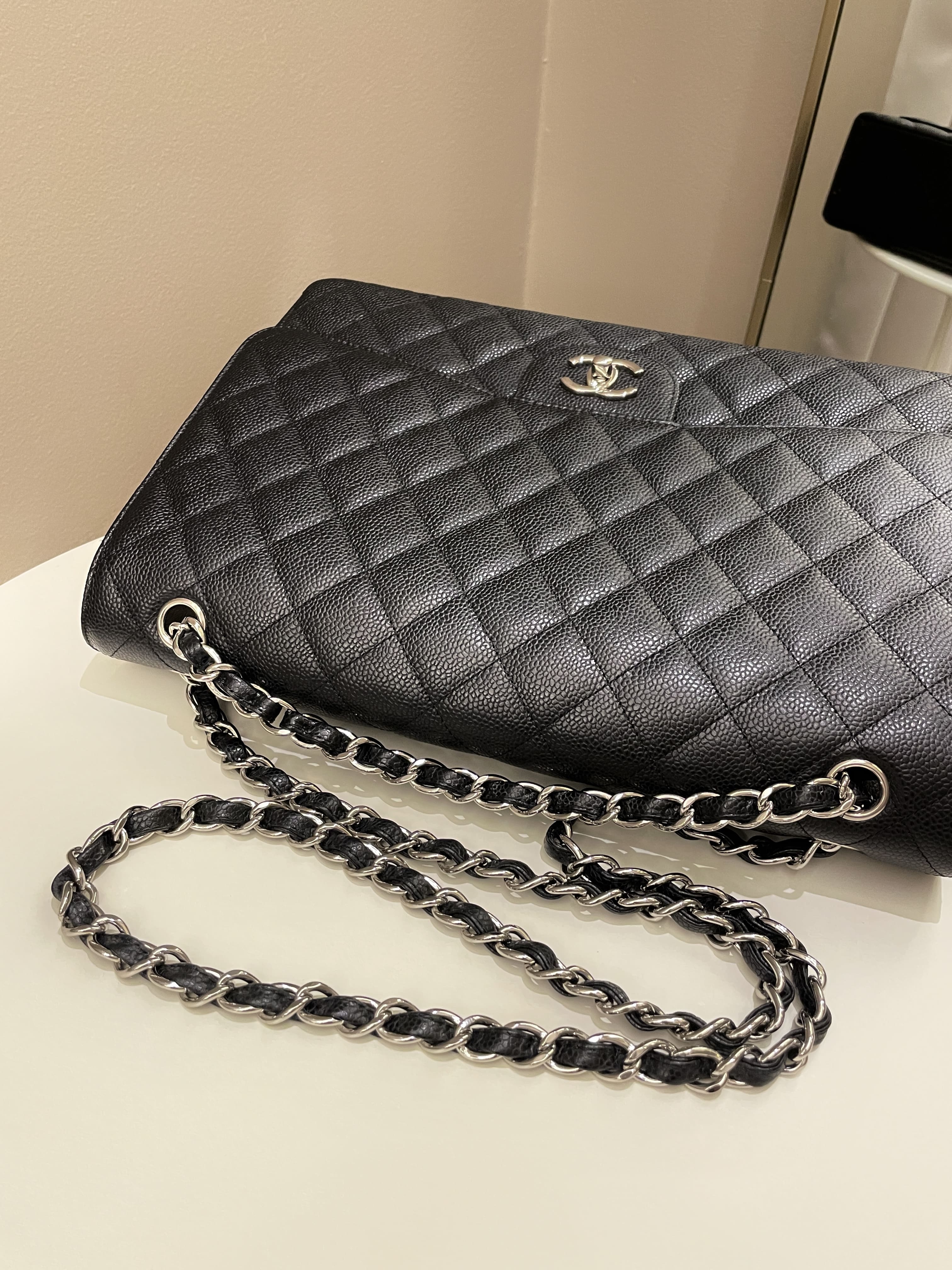 Chanel Classic Quilted Maxi Single Flap Black Caviar