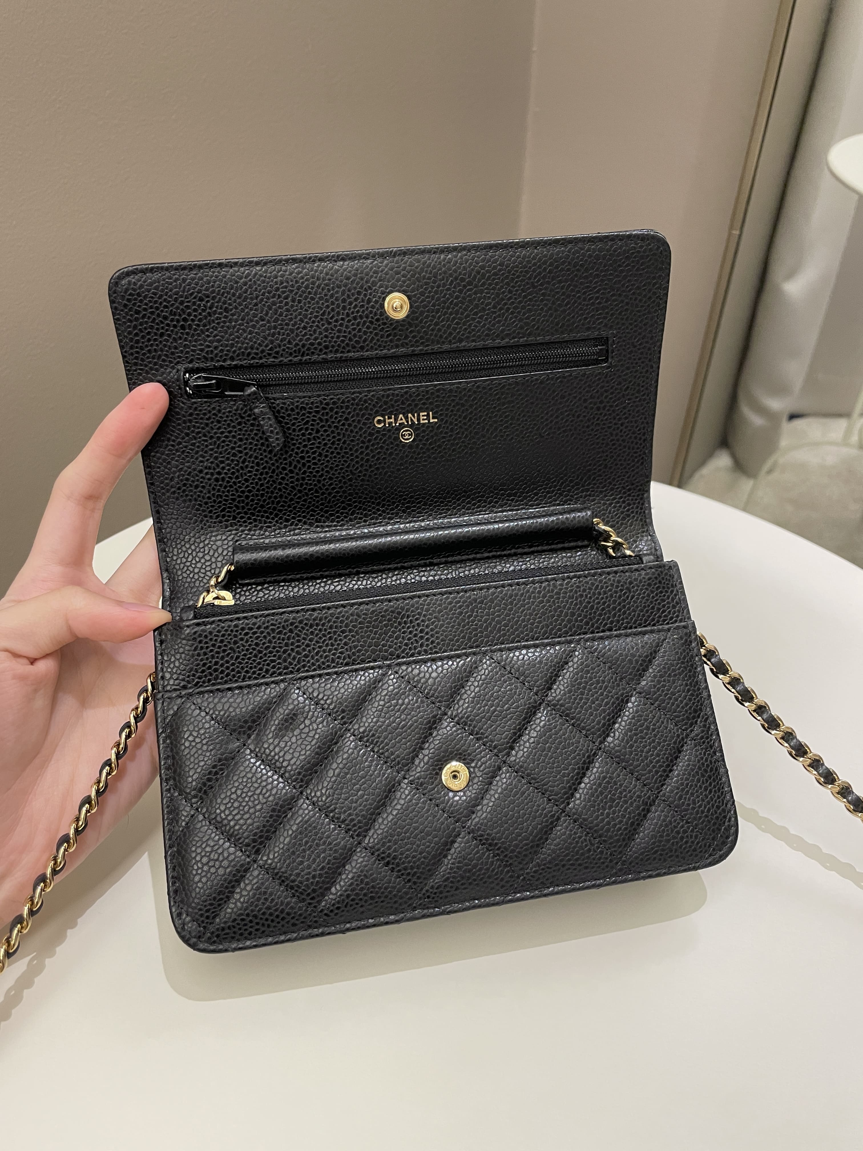 Sold at Auction: Chanel Black Caviar Boy WOC With GHW With Gold