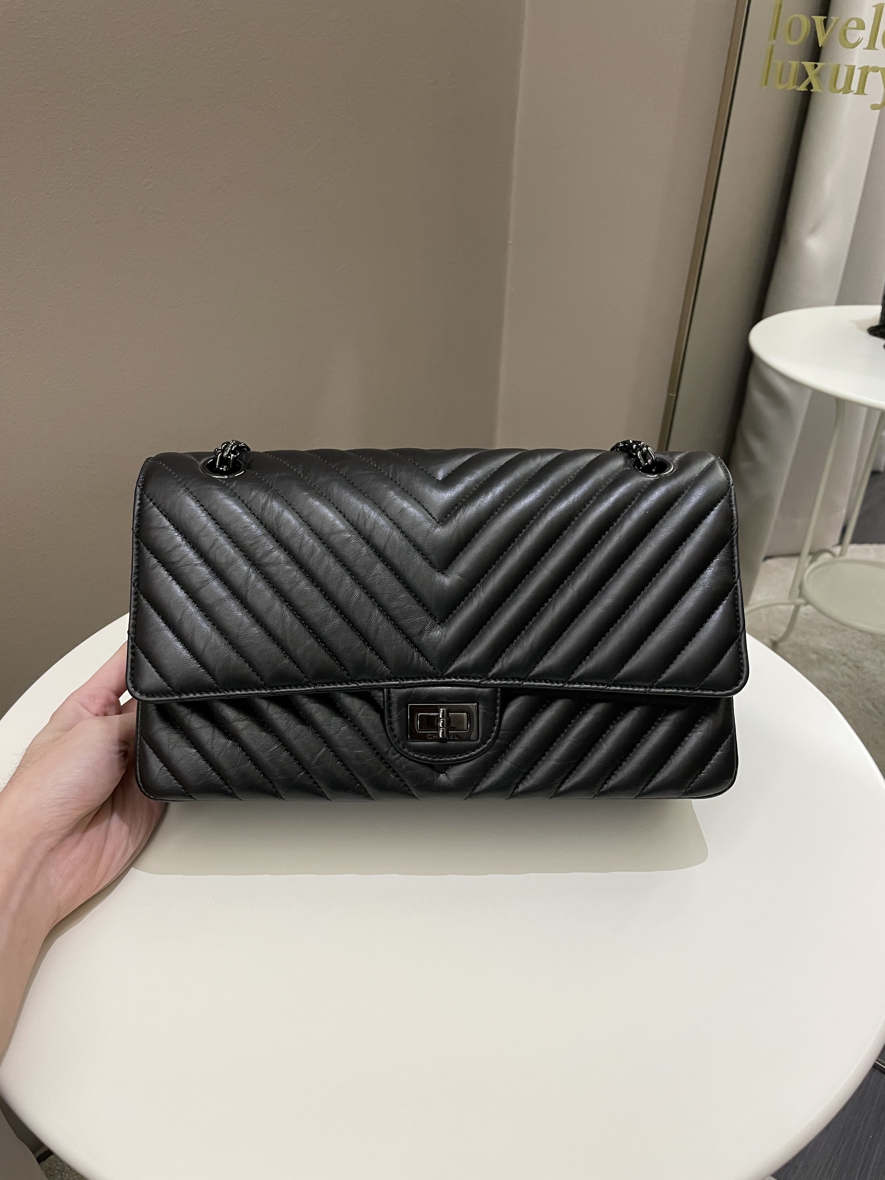 CHANEL Aged Calfskin Chevron Quilted 2.55 Reissue Mini Flap So Black  1205527