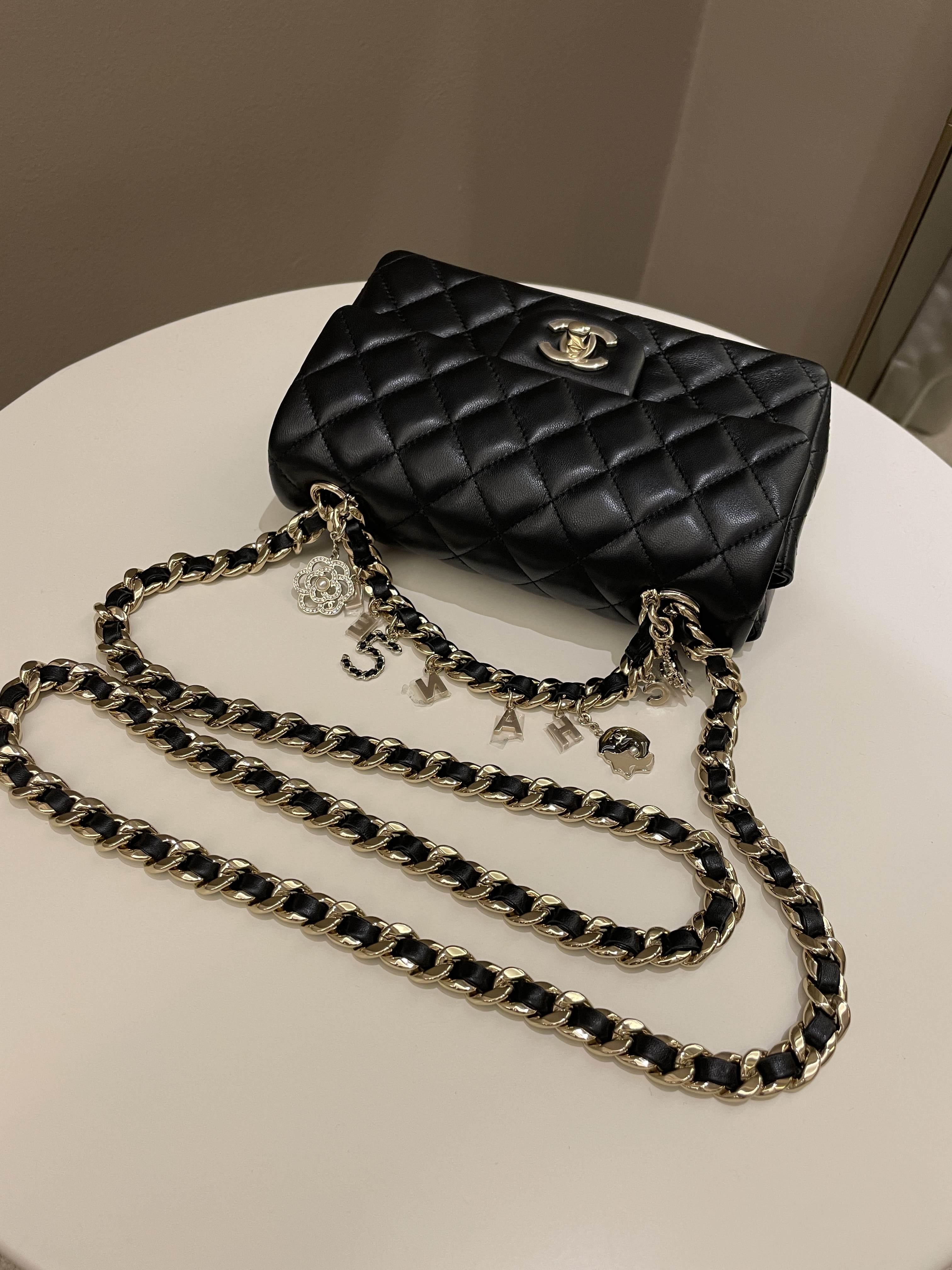 Chanel Quilted Mini Coco Charms Rectangular Flap Black Lambskin