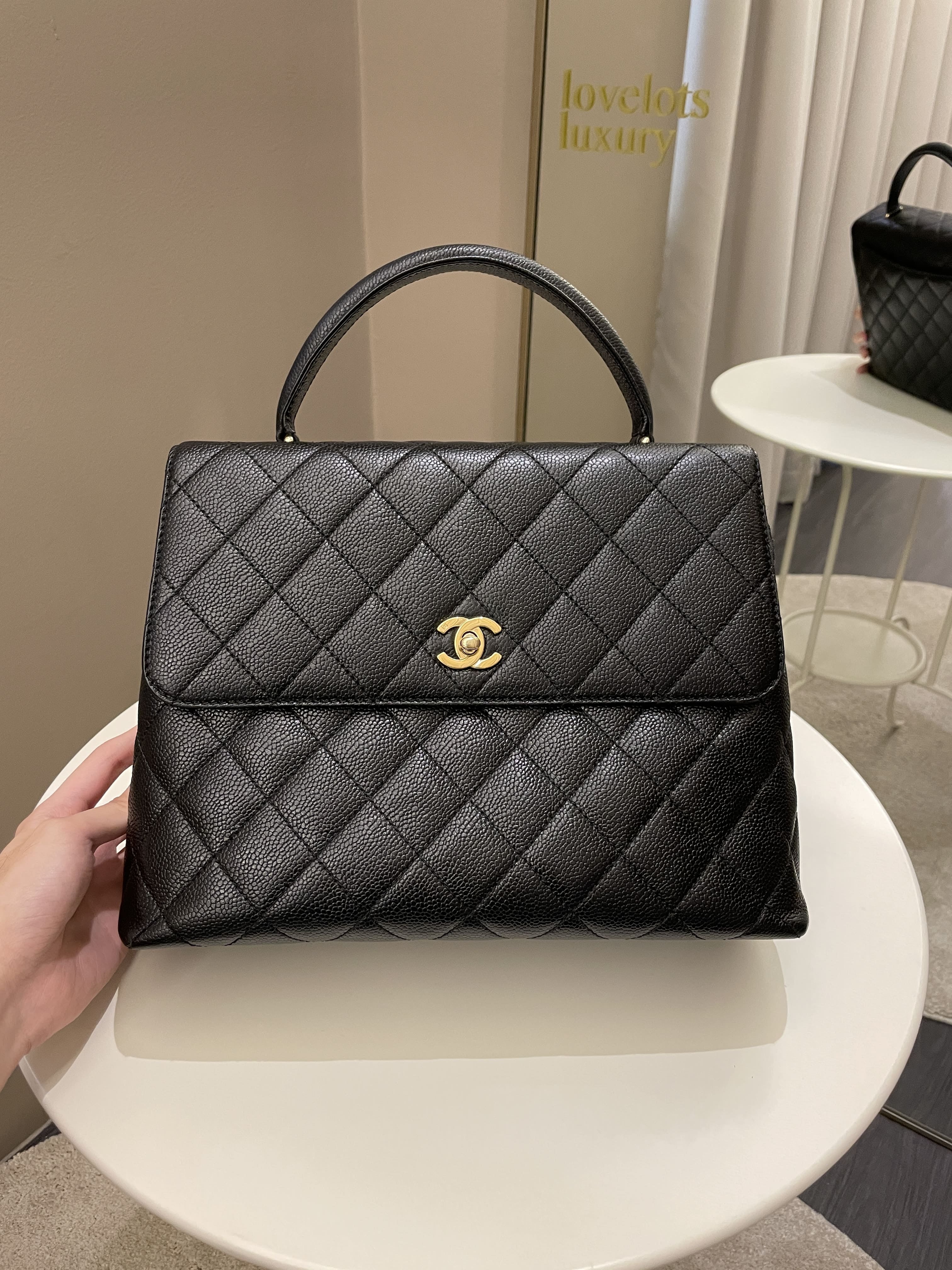 Chanel Kelly Quilted Top Handle Flap Black Caviar