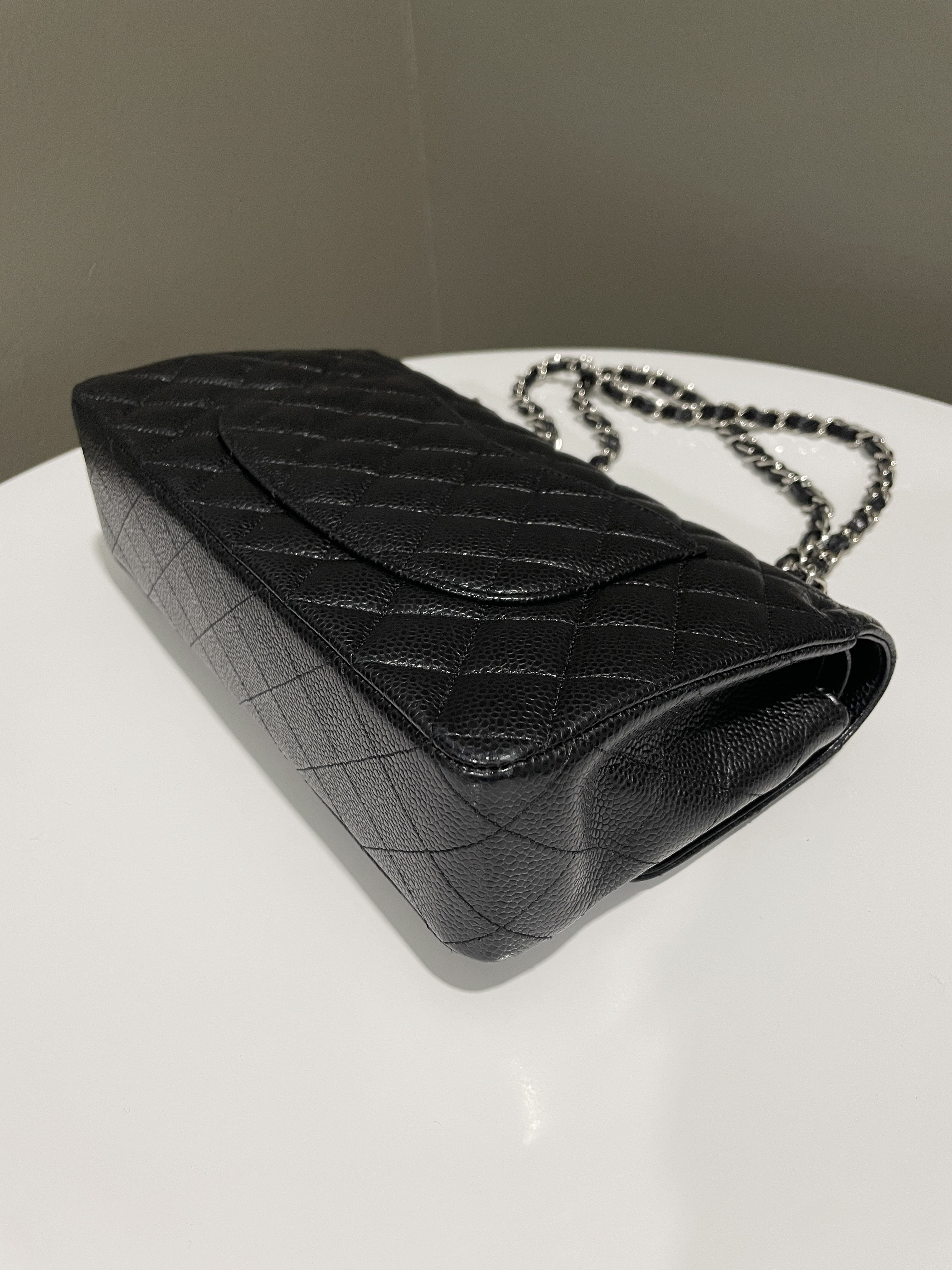 Chanel Classic Quilted Medium Double Flap
Black Caviar