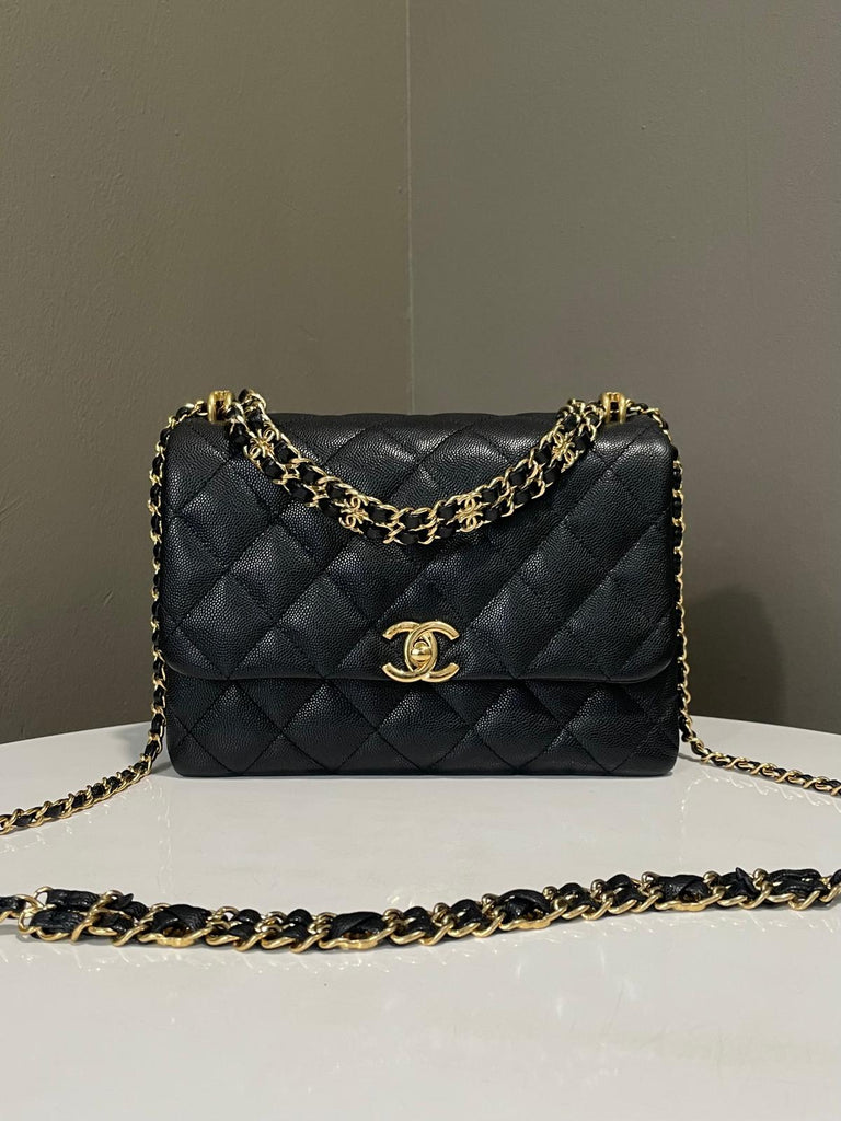 Chanel 22K Coco First Flap Bag Black Caviar