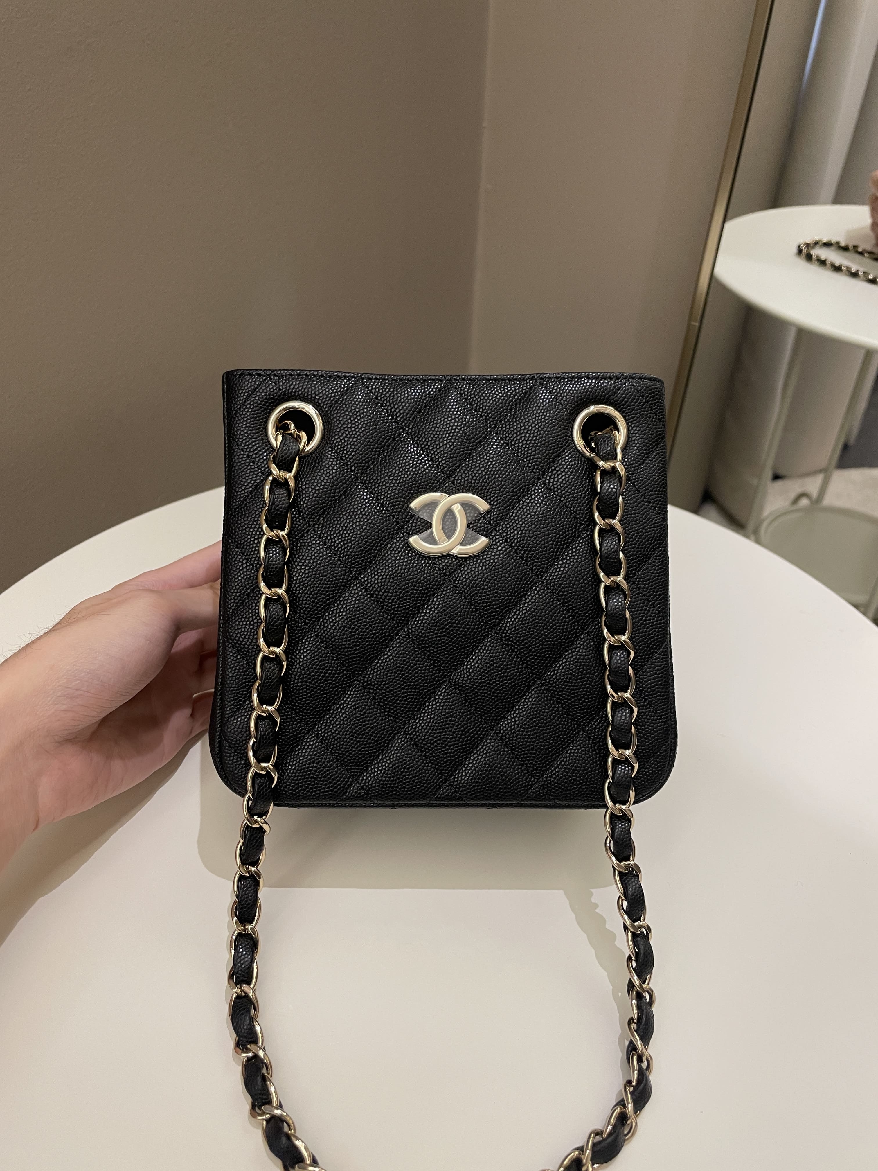 Chanel 22S mini bucket bag in black Caviar in LGHW Luxury Bags  Wallets  on Carousell